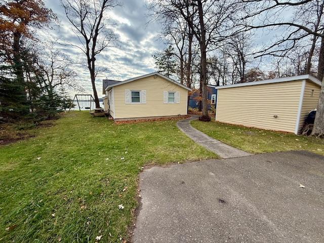 1950 single family home for sale at 22957 N Platte Lake Road in Hillman, MN — 2 bed, 1 bath (photo 2 of 8)