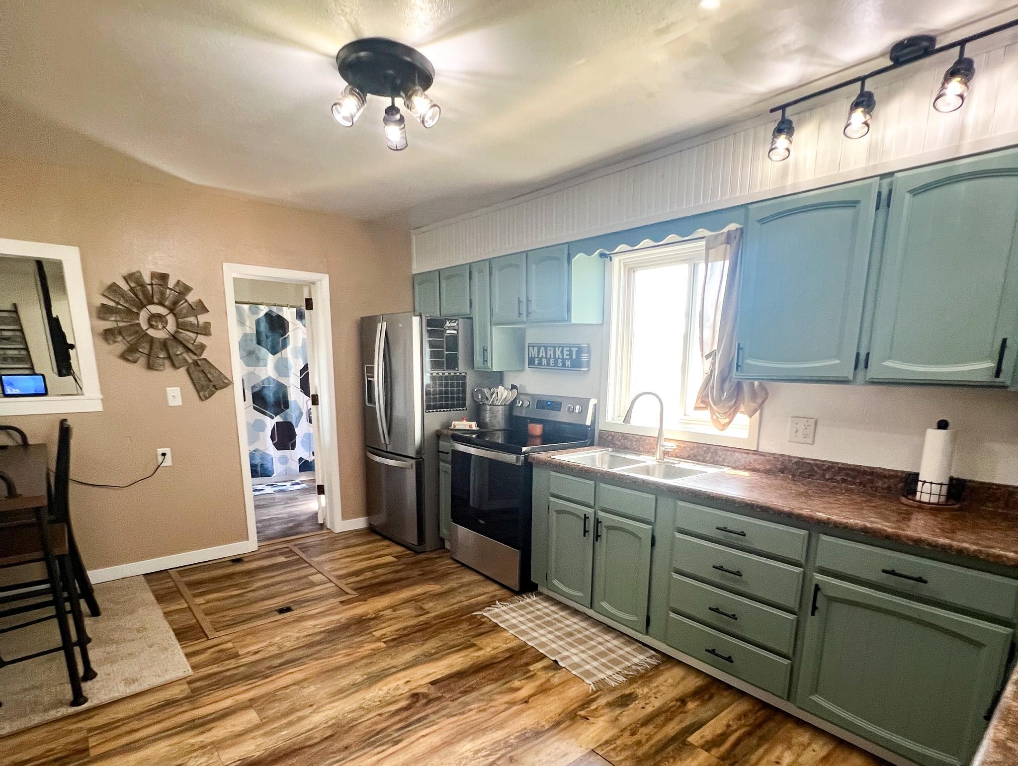 1900 single family home for sale at 212 Norman Avenue NW in Twin Valley, MN — 2 bed, 1 bath (photo 6 of 28)