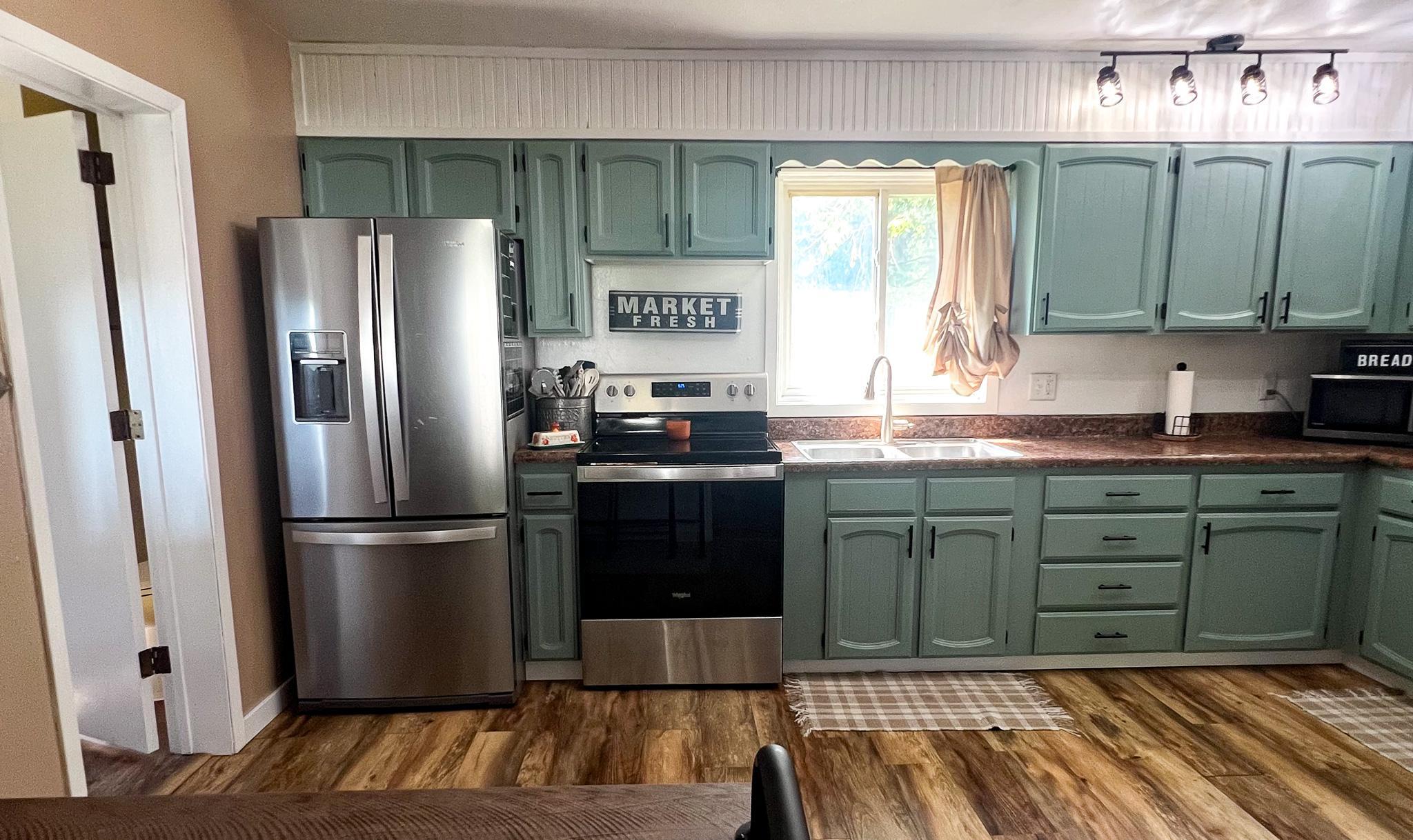1900 single family home for sale at 212 Norman Avenue NW in Twin Valley, MN — 2 bed, 1 bath (photo 7 of 28)