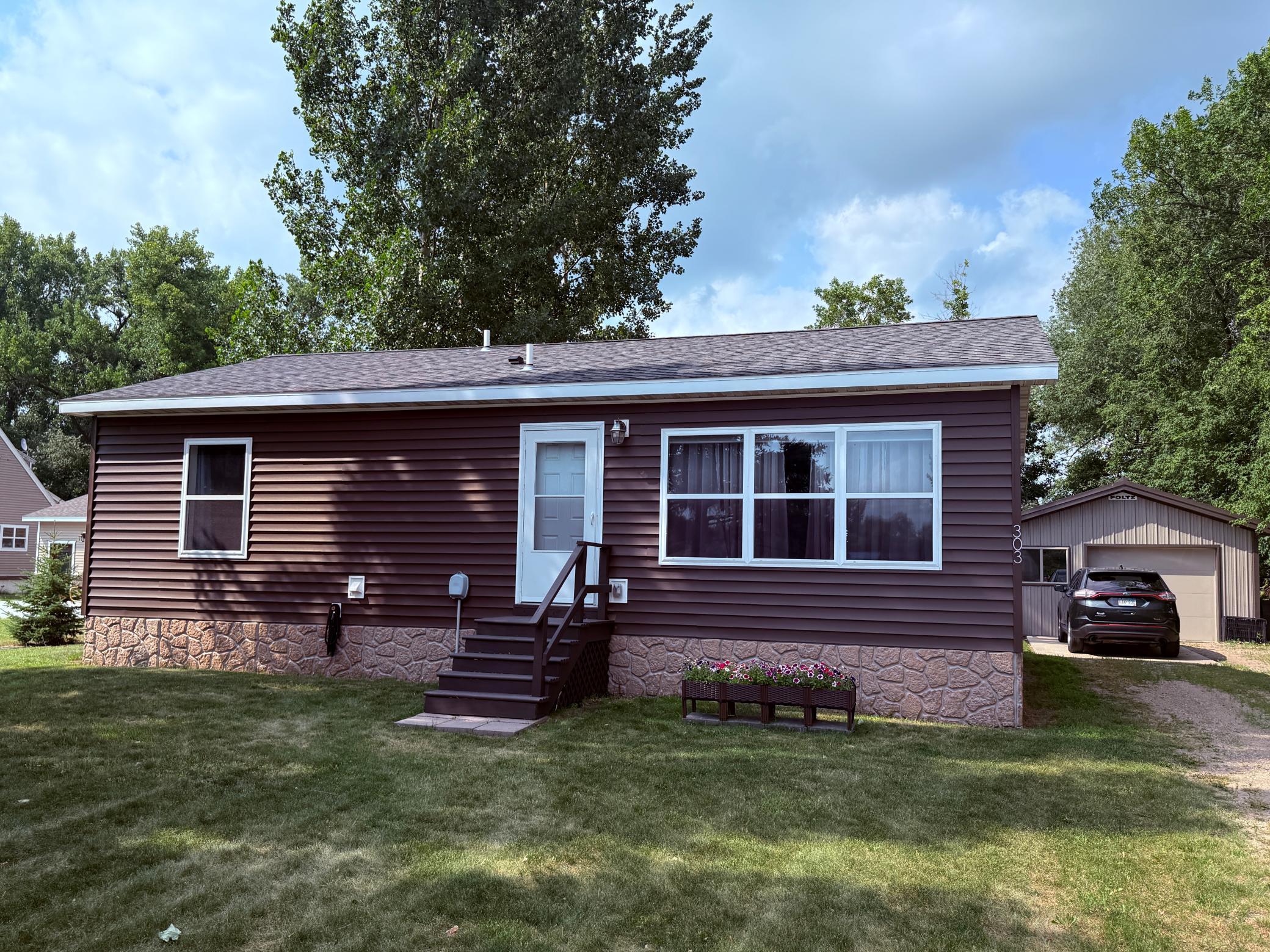 2022 single family home for sale at 303 1st Avenue E in Gary, MN — 2 bed, 2 bath (photo 2 of 27)
