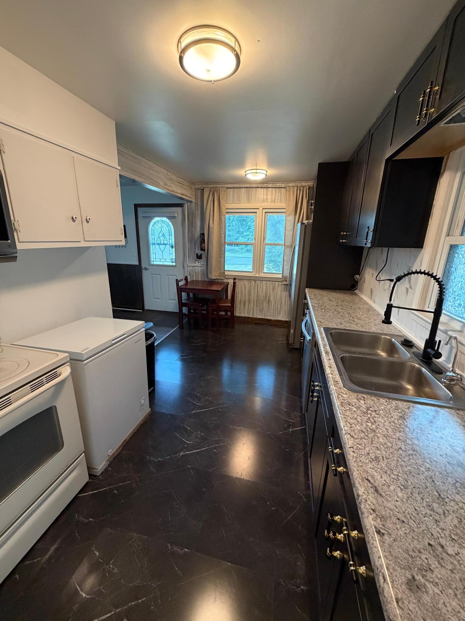 1957 single family home for sale at 610 S Main Street in Badger, MN — 3 bed, 1 bath (photo 3 of 23)