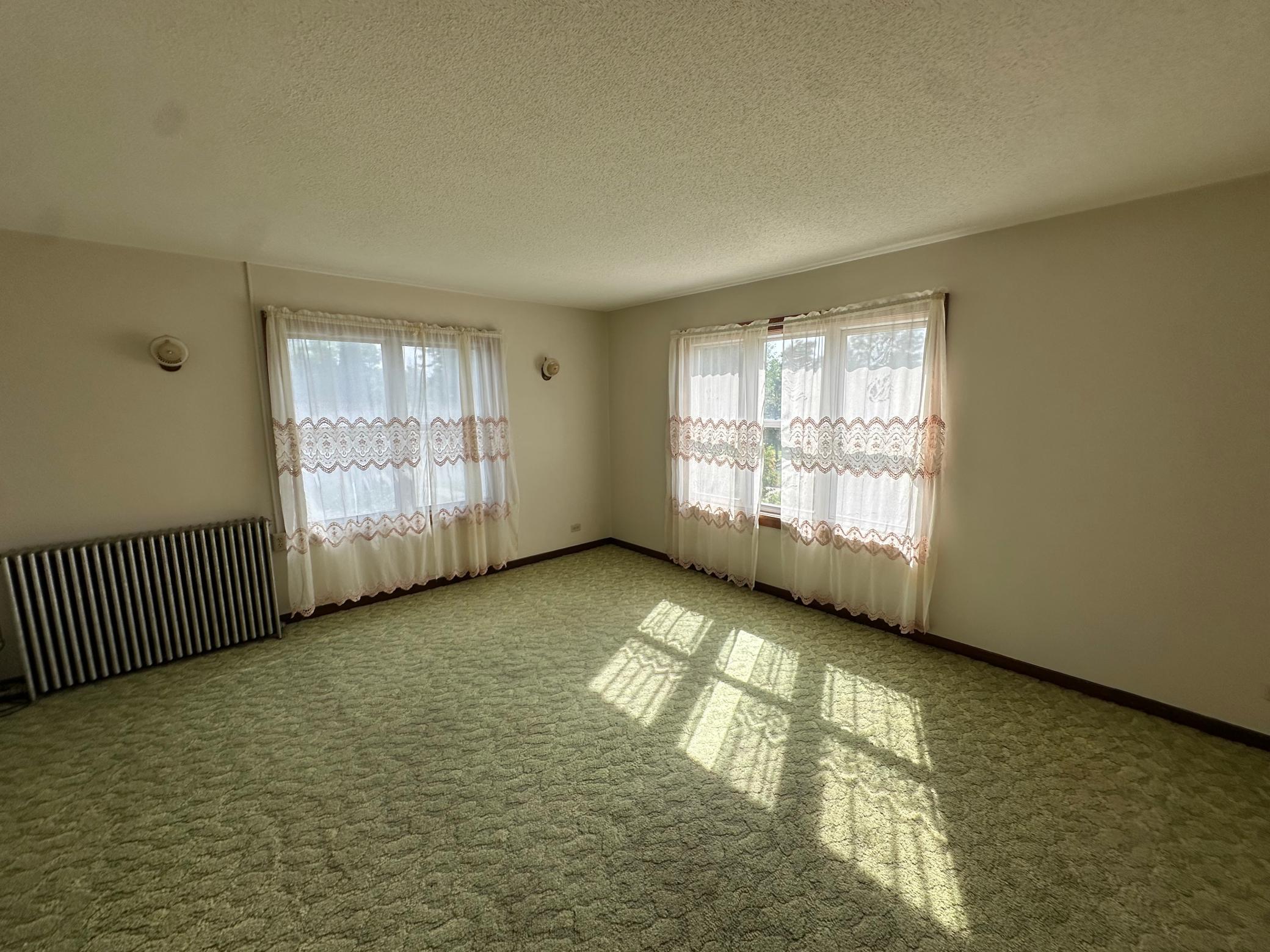 1934 triplex for sale at 510 Arnold Avenue N in Thief River Falls, MN — 4 bed, 3 bath (photo 6 of 14)