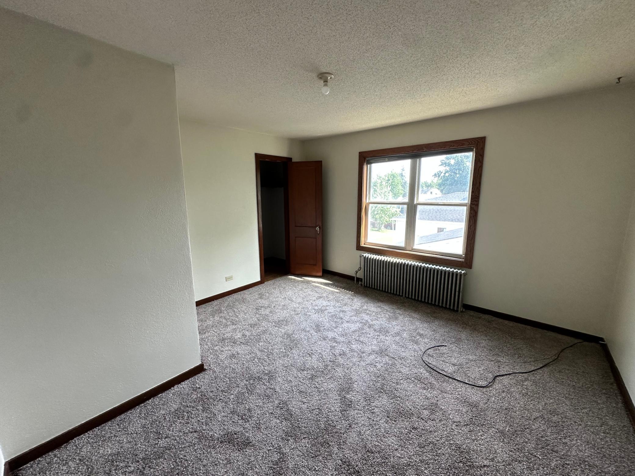 1934 triplex for sale at 510 Arnold Avenue N in Thief River Falls, MN — 4 bed, 3 bath (photo 7 of 14)