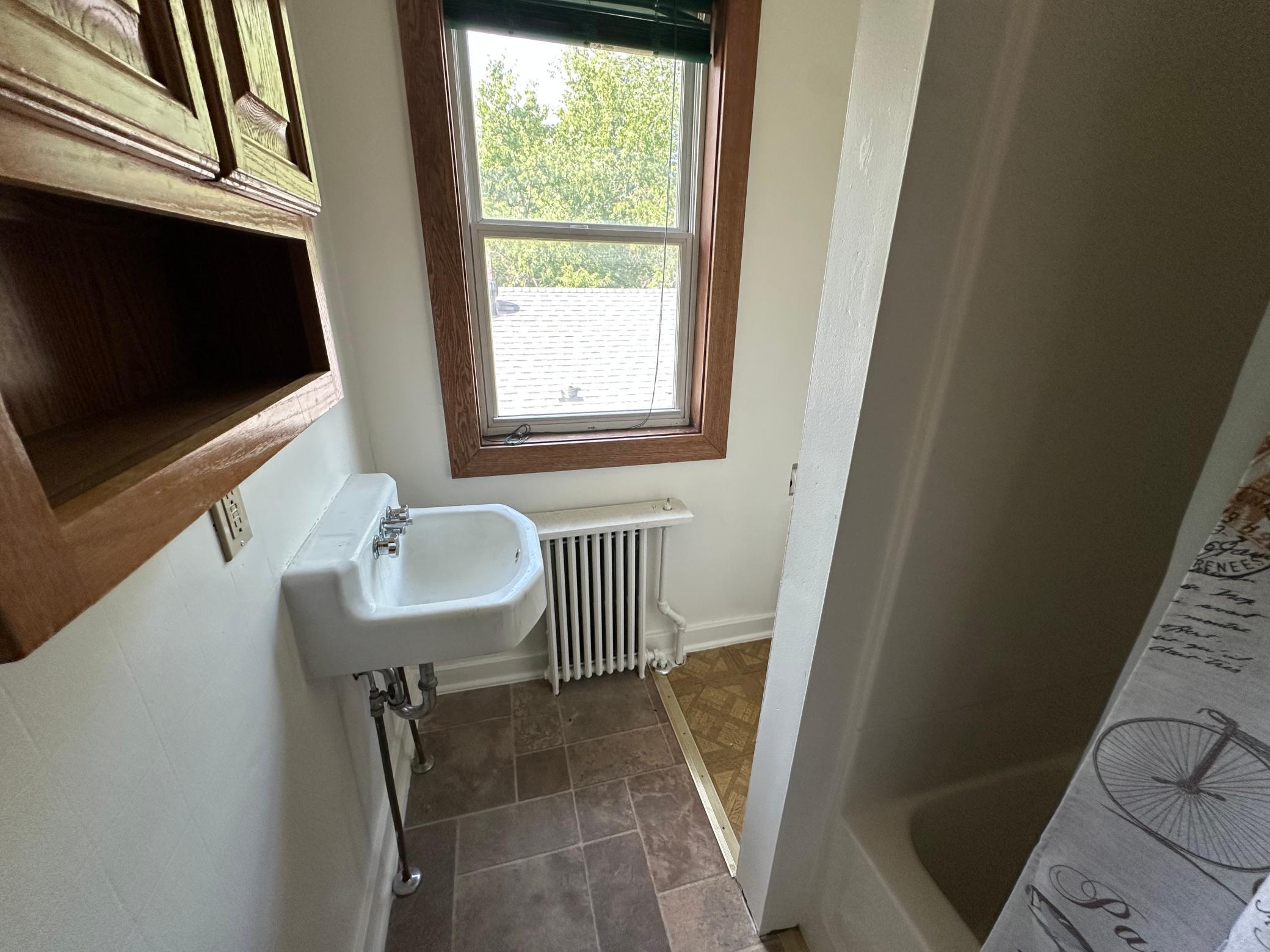 1934 triplex for sale at 510 Arnold Avenue N in Thief River Falls, MN — 4 bed, 3 bath (photo 8 of 14)