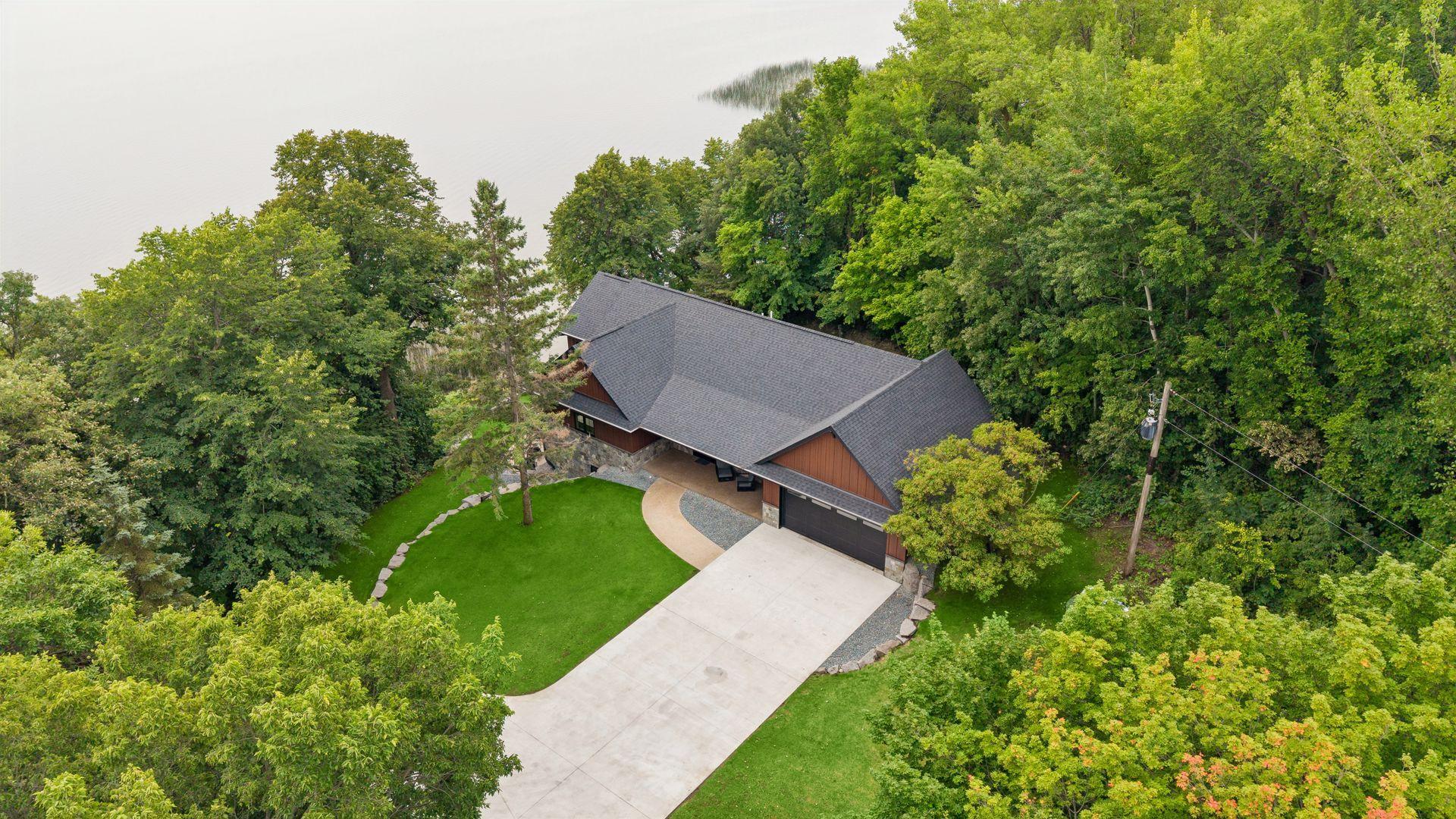 2025 single family home for sale at 4811 Wharry Heights Road SW in Alexandria, MN — 4 bed, 5 bath (photo 3 of 59)