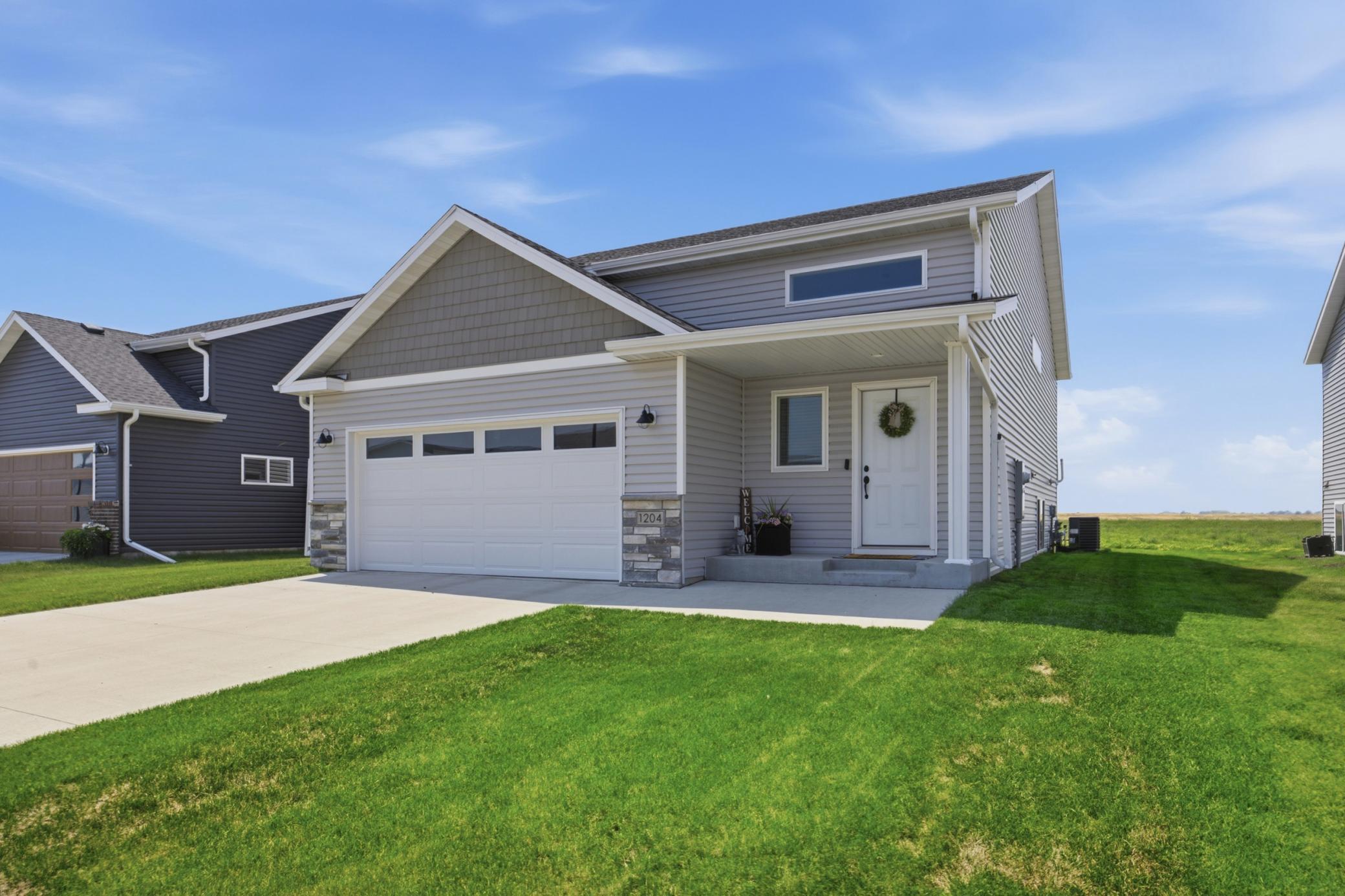 2023 single family home for sale at 1204 Marlys Drive W in West Fargo, ND — 3 bed, 3 bath (photo 2 of 41)