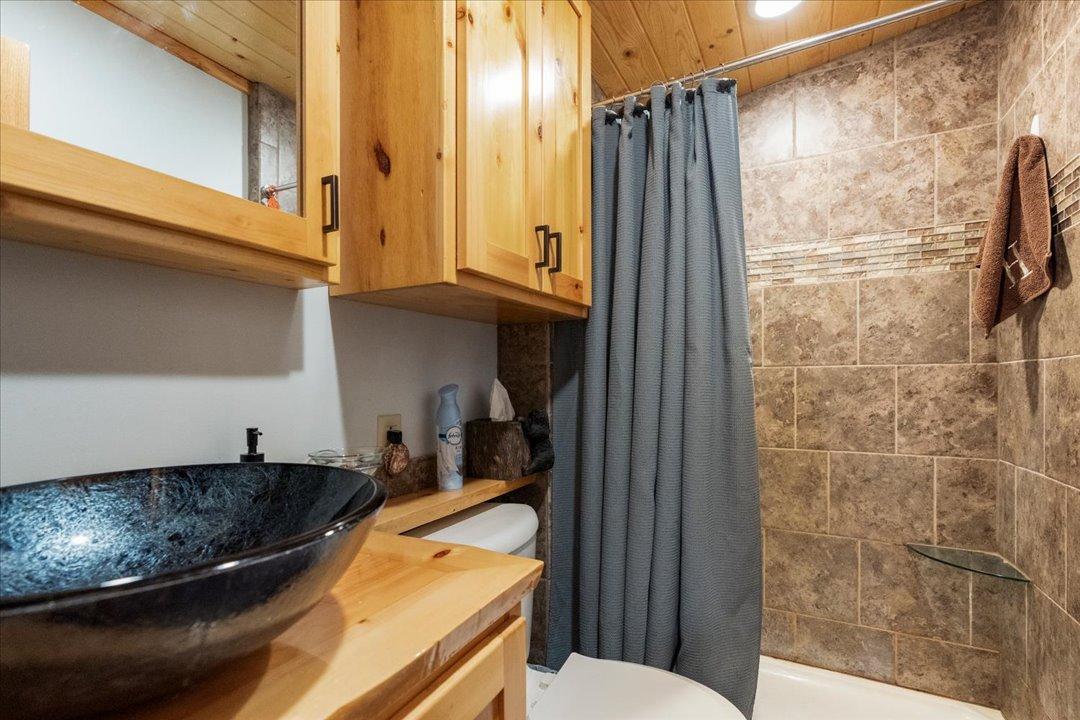 1985 single family home for sale at 15827 Wilderness Trail, Unit 106 in Cross Lake, MN — 2 bed, 1 bath (photo 12 of 31)