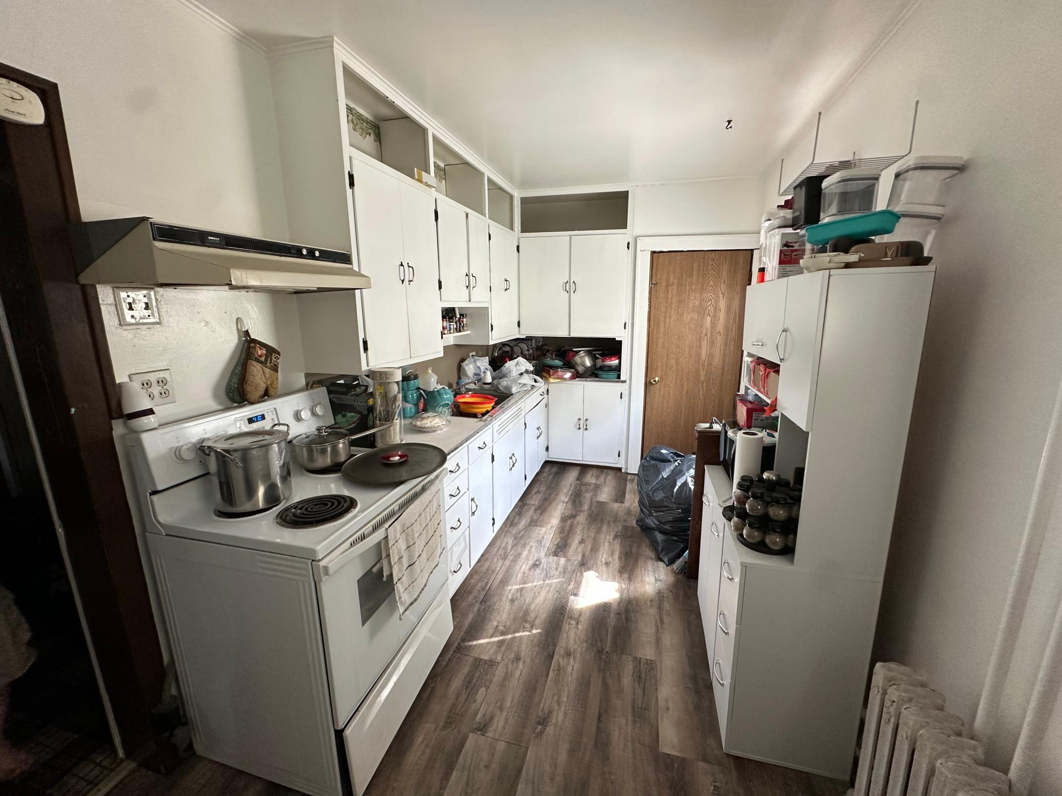 1910 triplex for sale at 623 Horace Avenue N in Thief River Falls, MN — 5 bed, 3 bath (photo 5 of 8)