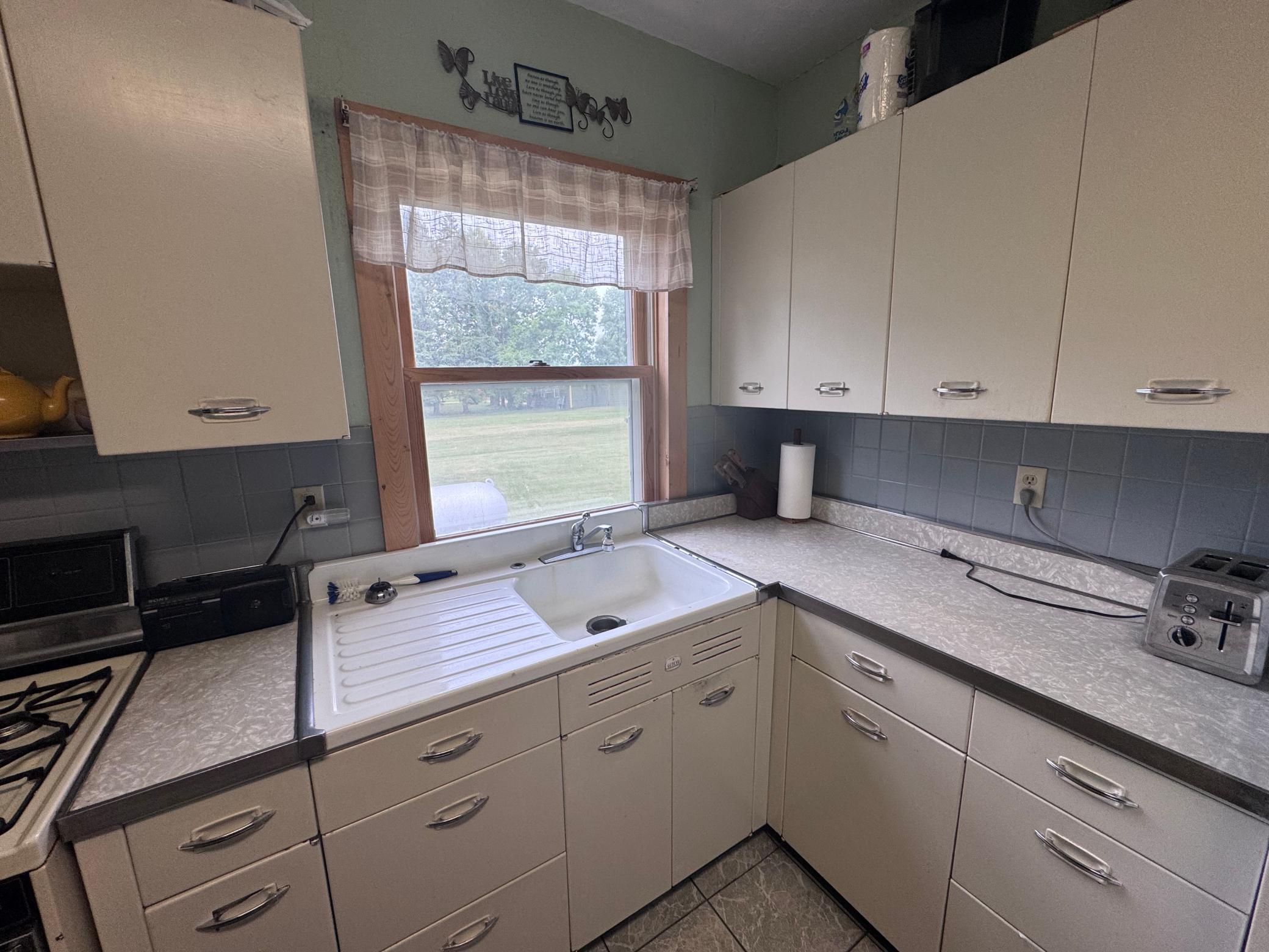 1920 single family home for sale at 185 Red Lake Avenue E in Plummer, MN — 4 bed, 1 bath (photo 4 of 30)
