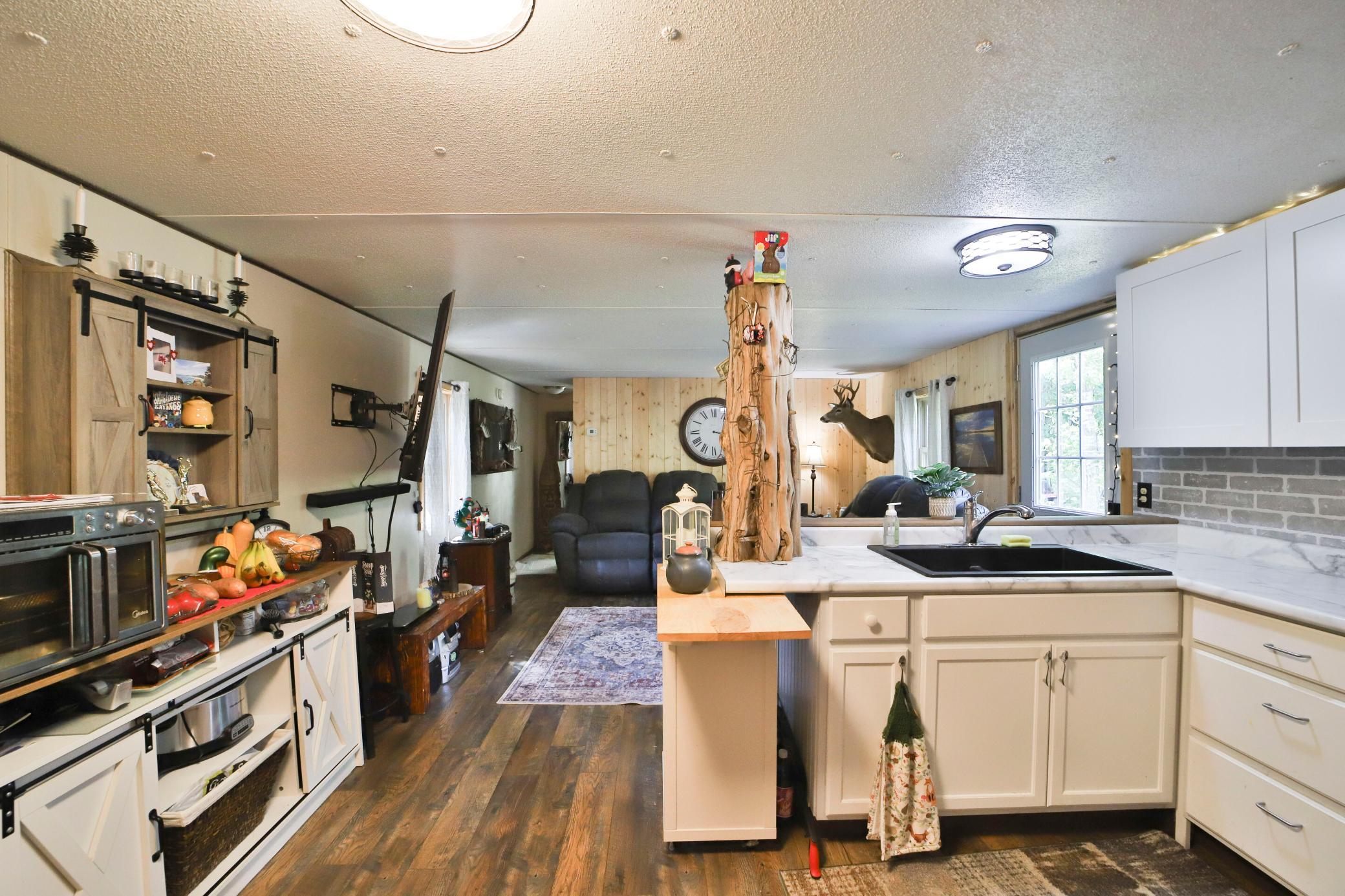 1990 single family home for sale at 14648 Ridgeway Road in Crosslake, MN — 2 bed, 1 bath (photo 5 of 39)