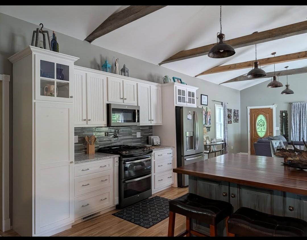 1945 single family home for sale at 256 Spirit Avenue NW in Wilton, MN — 3 bed, 3 bath (photo 2 of 5)