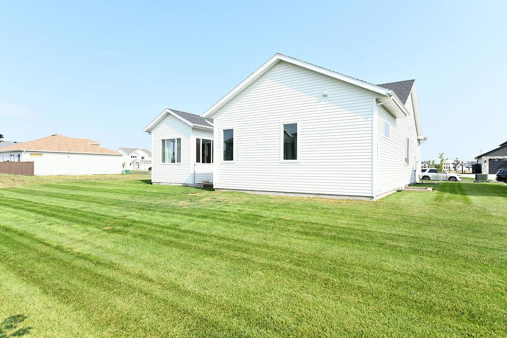 2022 single family home for sale at 7902 Firefly Lane in Horace, ND — 5 bed, 3 bath (photo 42 of 43)