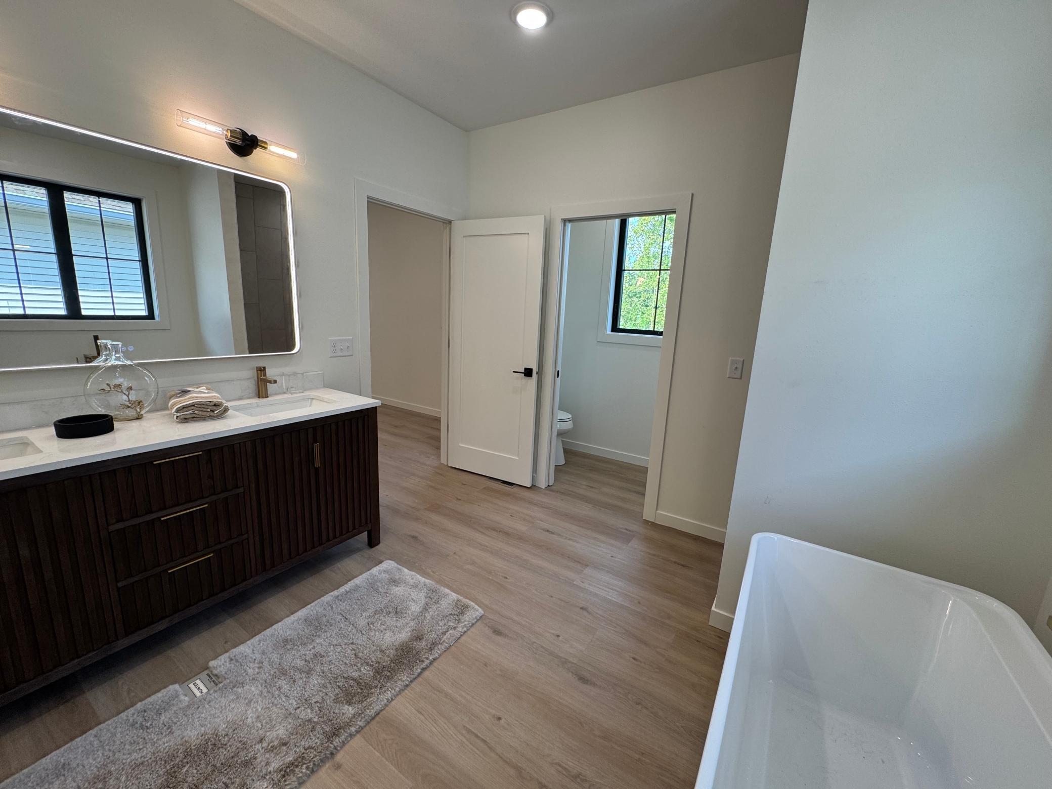 2026 single family home for sale at 1215 Moor Stone Drive NE in Alexandria, MN — 5 bed, 3 bath (photo 22 of 45)