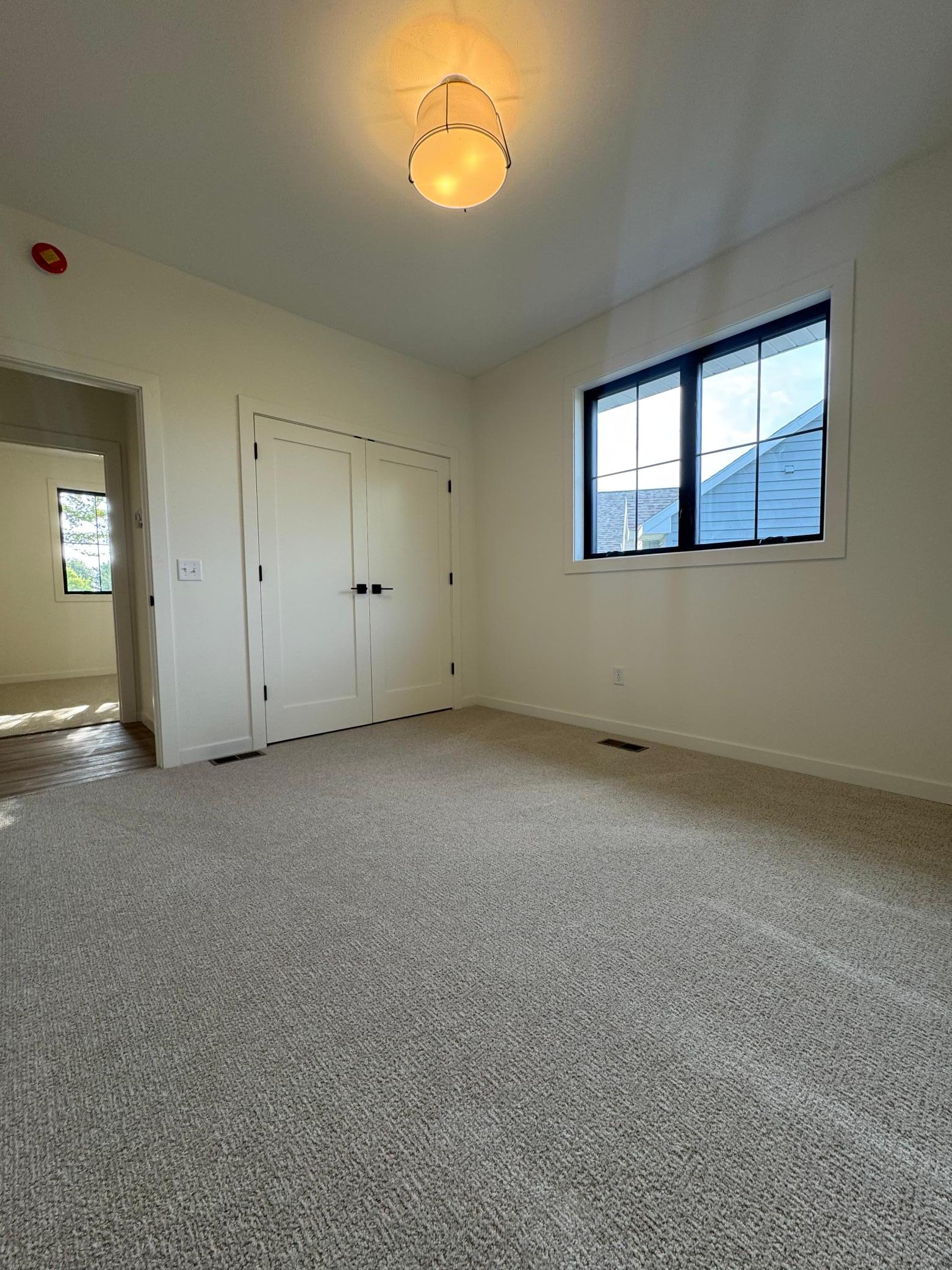 2026 single family home for sale at 1215 Moor Stone Drive NE in Alexandria, MN — 5 bed, 3 bath (photo 28 of 45)