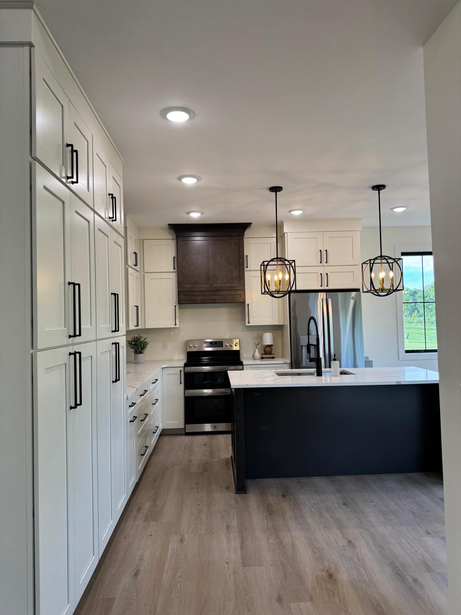 2026 single family home for sale at 1215 Moor Stone Drive NE in Alexandria, MN — 5 bed, 3 bath (photo 8 of 45)