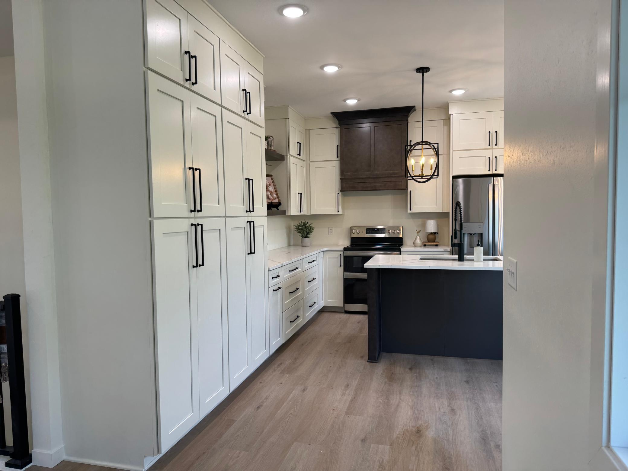 2026 single family home for sale at 1215 Moor Stone Drive NE in Alexandria, MN — 5 bed, 3 bath (photo 9 of 45)