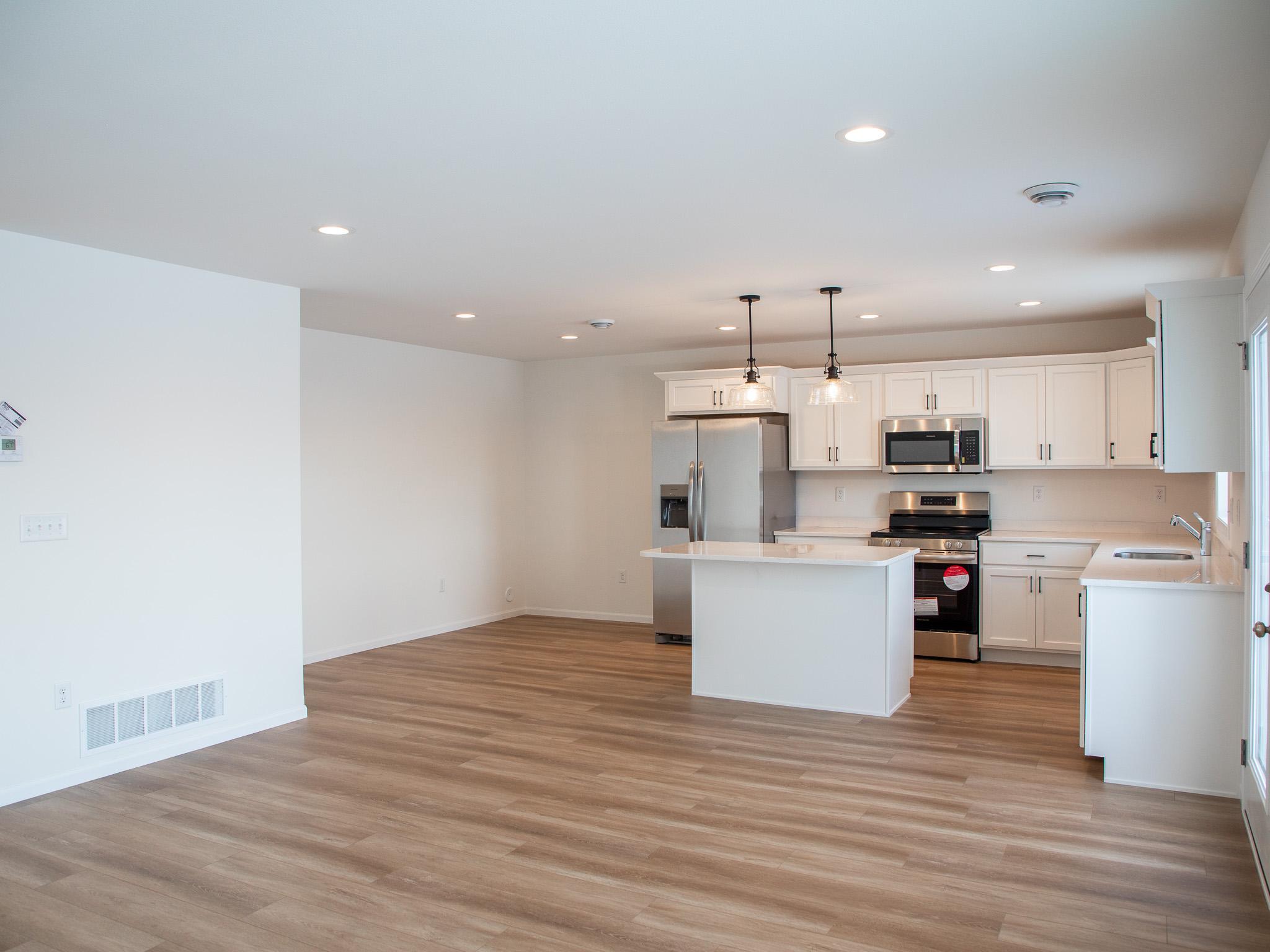 2026 single family home for sale at 1142 W 55 Avenue in West Fargo, ND — 3 bed, 3 bath (photo 4 of 13)