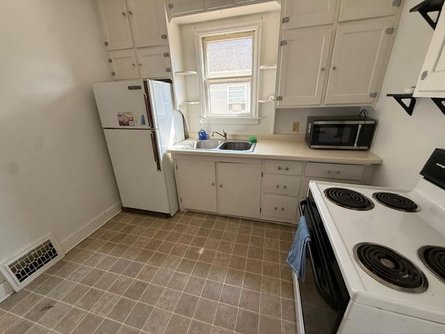 1916 single family home for sale at 213 11th Street N in Breckenridge, MN — 2 bed, 1 bath (photo 5 of 10)