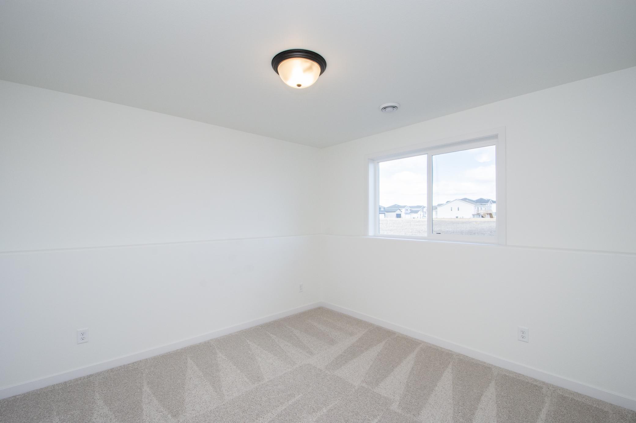 2026 single family home for sale at 6747 Selkirk Drive S in Fargo, ND — 4 bed, 3 bath (photo 18 of 26)