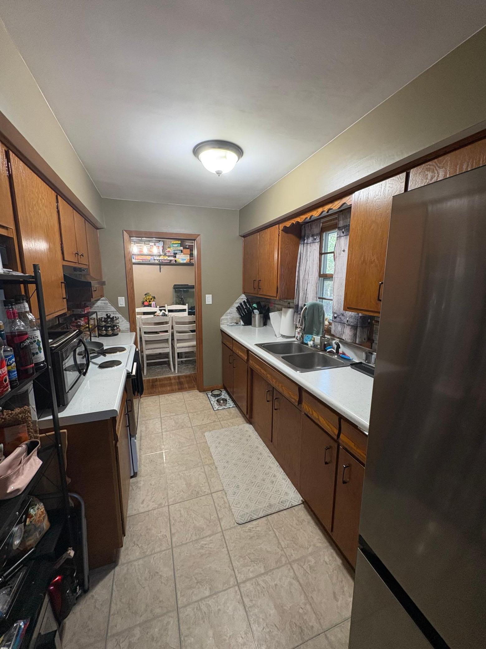 1980 single family home for sale at 1118 Broadway Street in Brainerd, MN — 3 bed, 1 bath (photo 5 of 14)