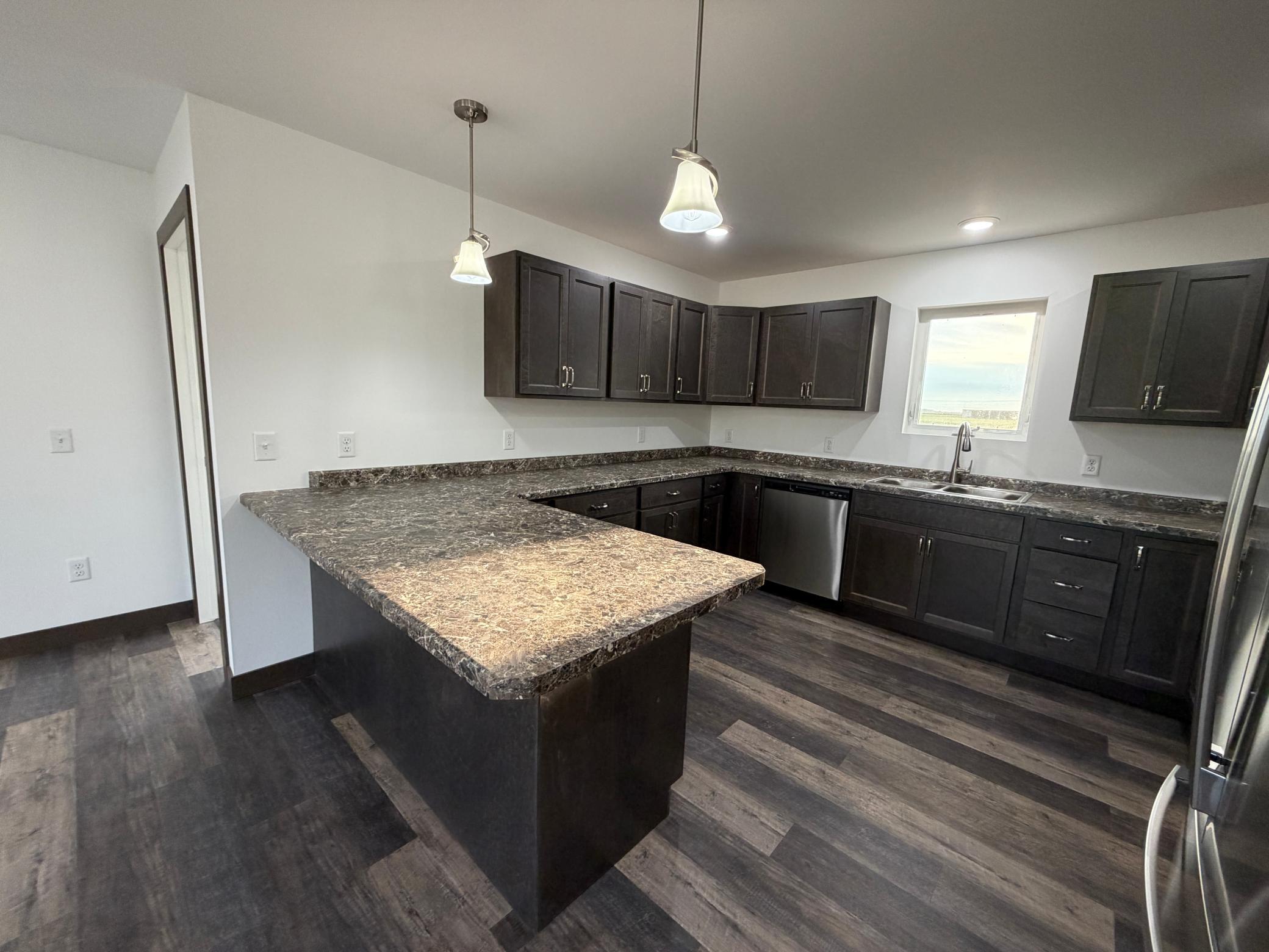 2025 single family home for sale at 1200 Main Avenue S in Roseau, MN — 3 bed, 2 bath (photo 7 of 25)