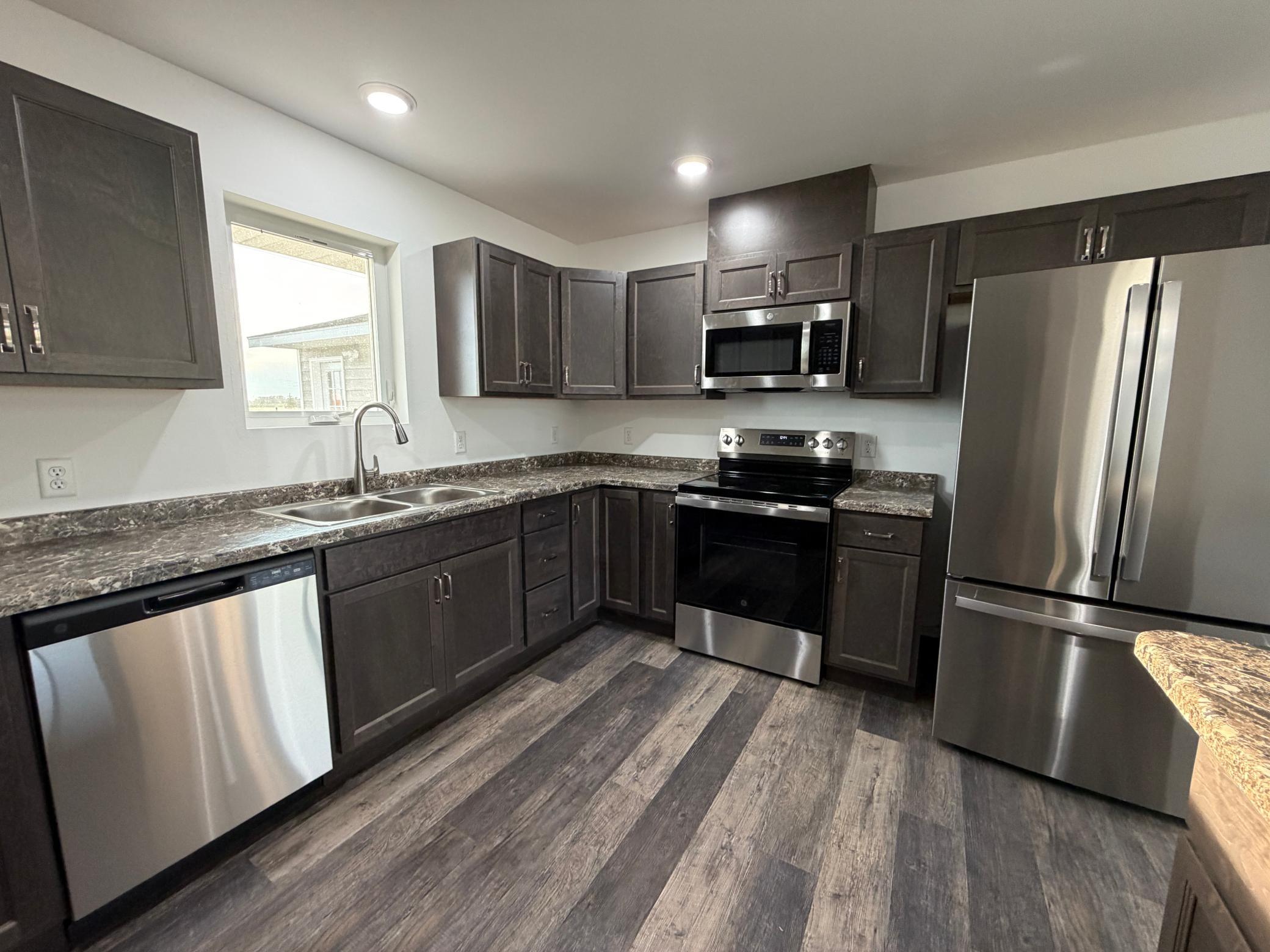 2025 single family home for sale at 1200 Main Avenue S in Roseau, MN — 3 bed, 2 bath (photo 8 of 25)