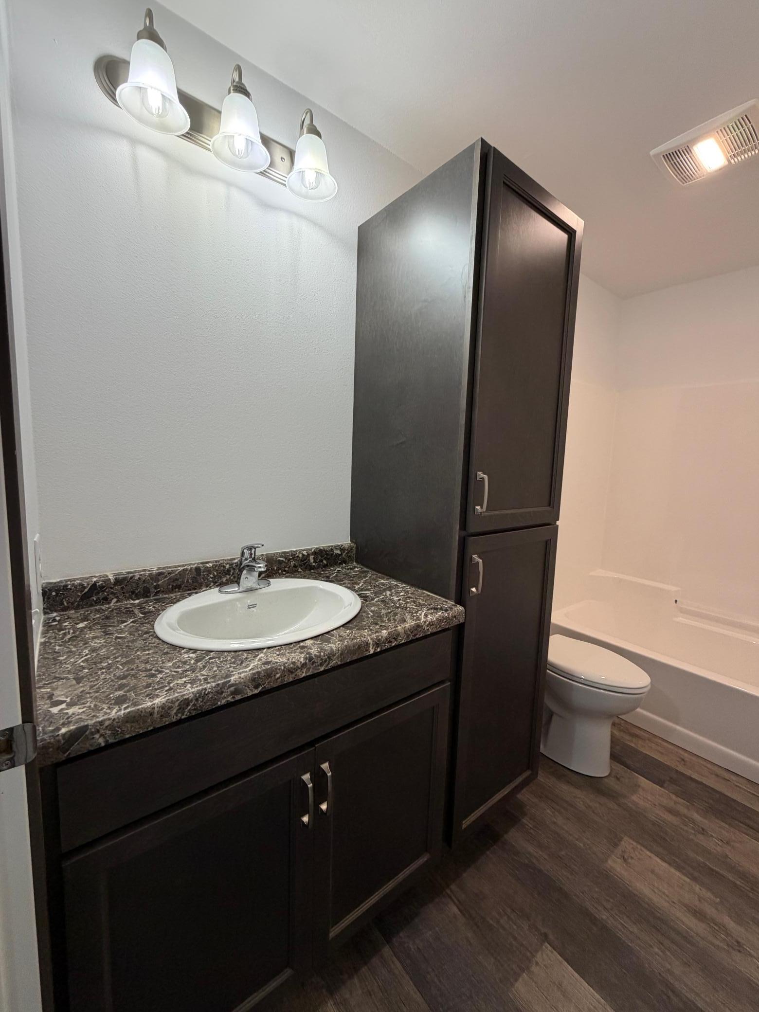 2025 single family home for sale at 100 Oak Crest Blvd in Roseau, MN — 3 bed, 2 bath (photo 18 of 23)