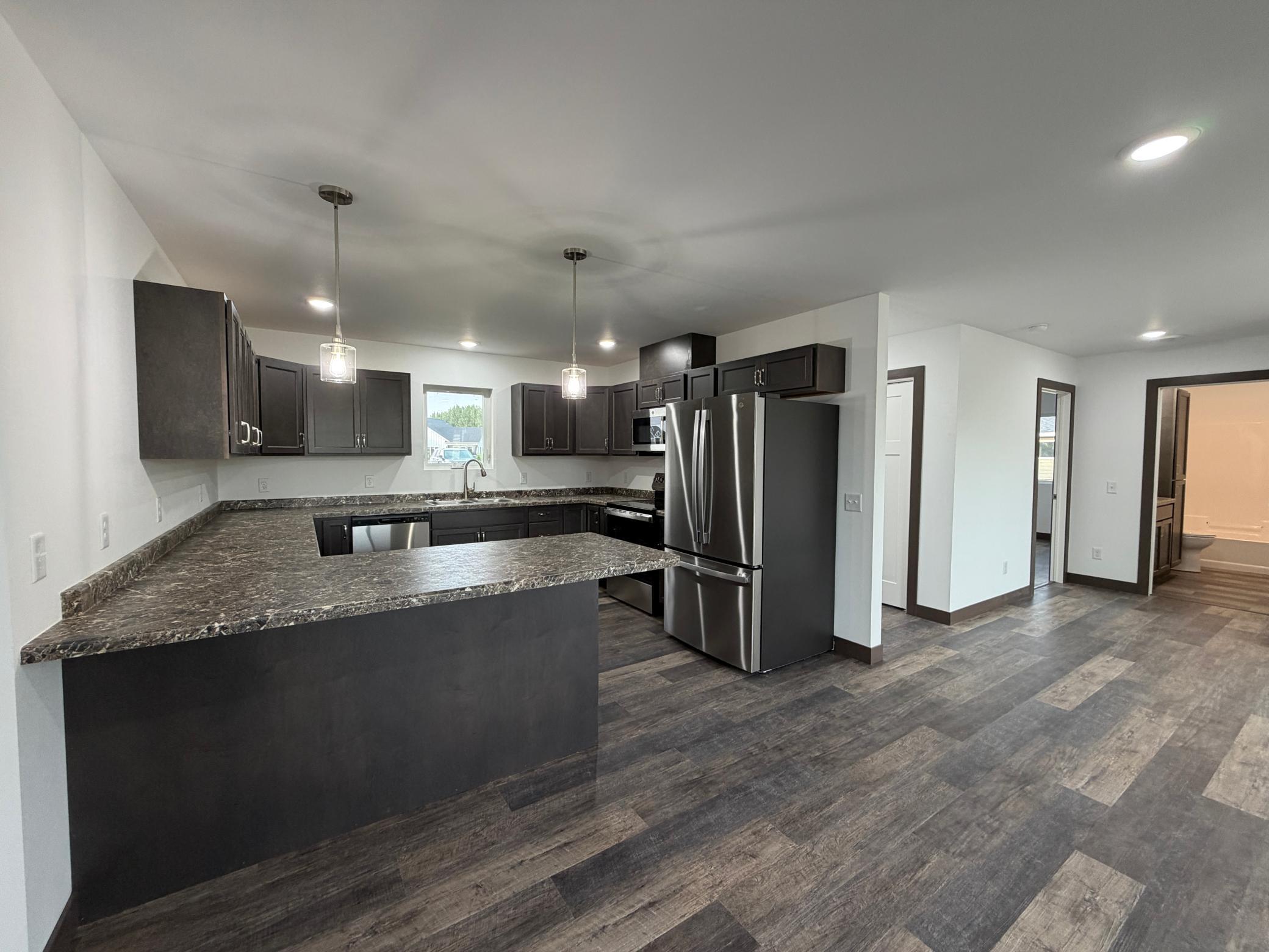 2025 single family home for sale at 100 Oak Crest Blvd in Roseau, MN — 3 bed, 2 bath (photo 4 of 23)