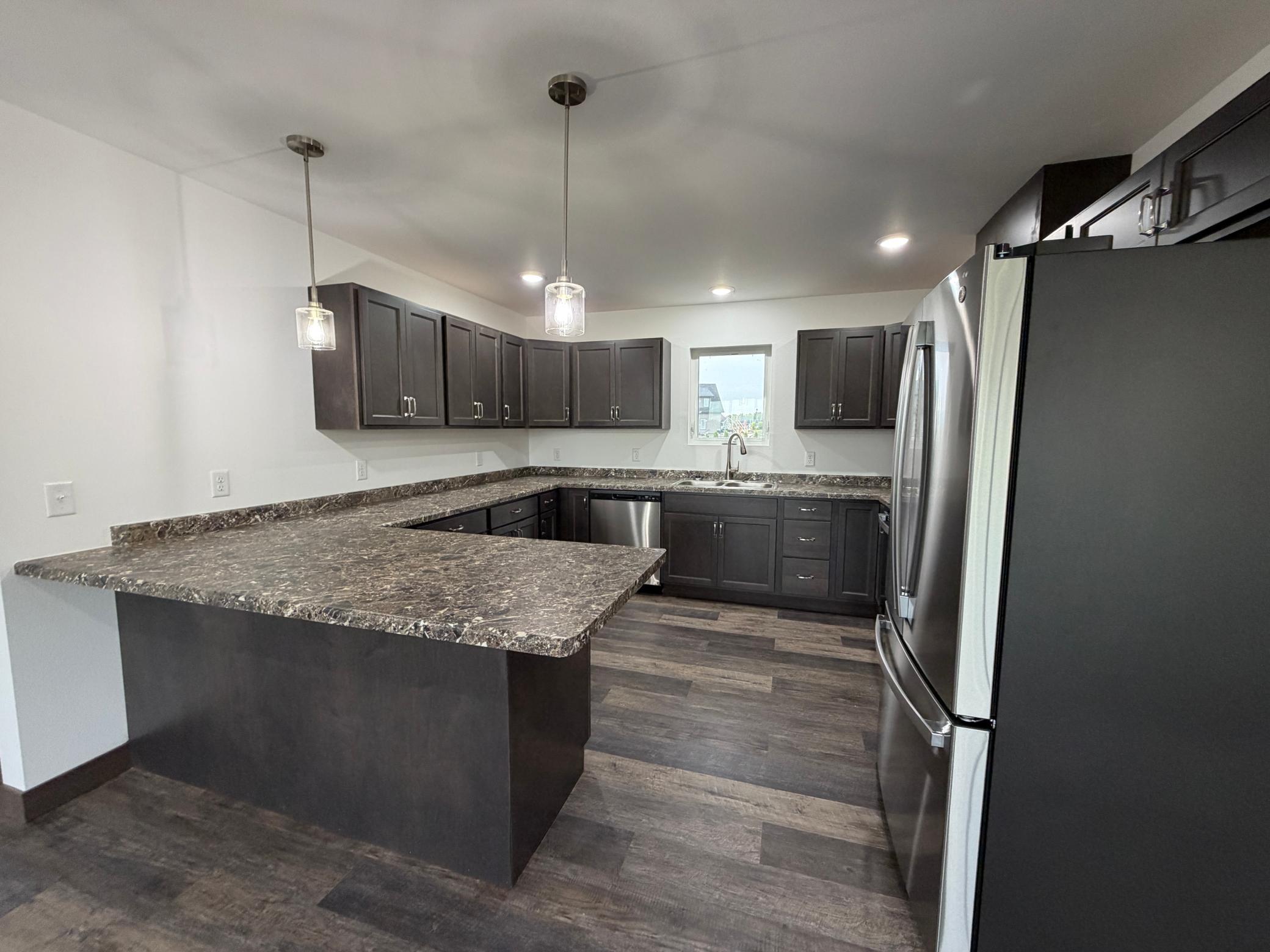2025 single family home for sale at 100 Oak Crest Blvd in Roseau, MN — 3 bed, 2 bath (photo 5 of 23)