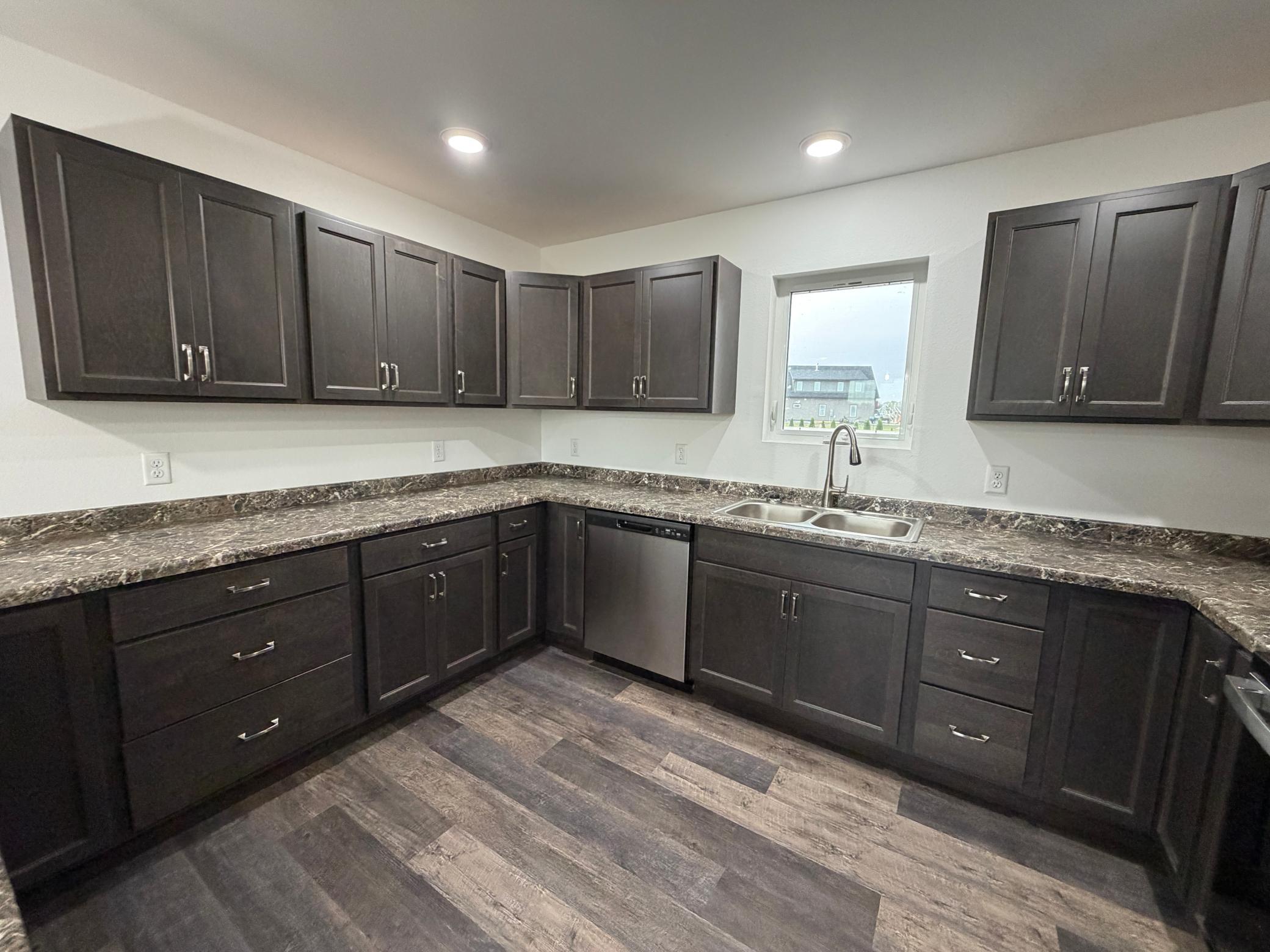 2025 single family home for sale at 100 Oak Crest Blvd in Roseau, MN — 3 bed, 2 bath (photo 7 of 23)