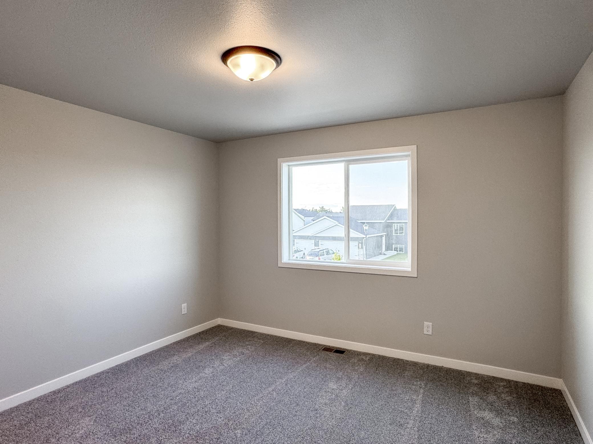 2025 single family home for sale at 1105 Jill Drive W in West Fargo, ND — 3 bed, 2 bath (photo 25 of 35)