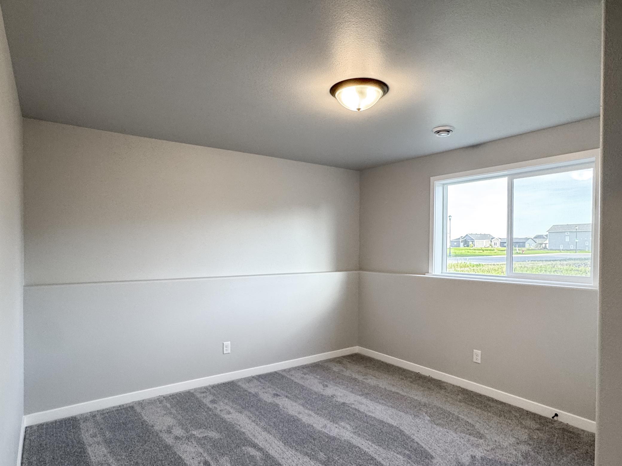 2025 single family home for sale at 1105 Jill Drive W in West Fargo, ND — 3 bed, 2 bath (photo 28 of 35)