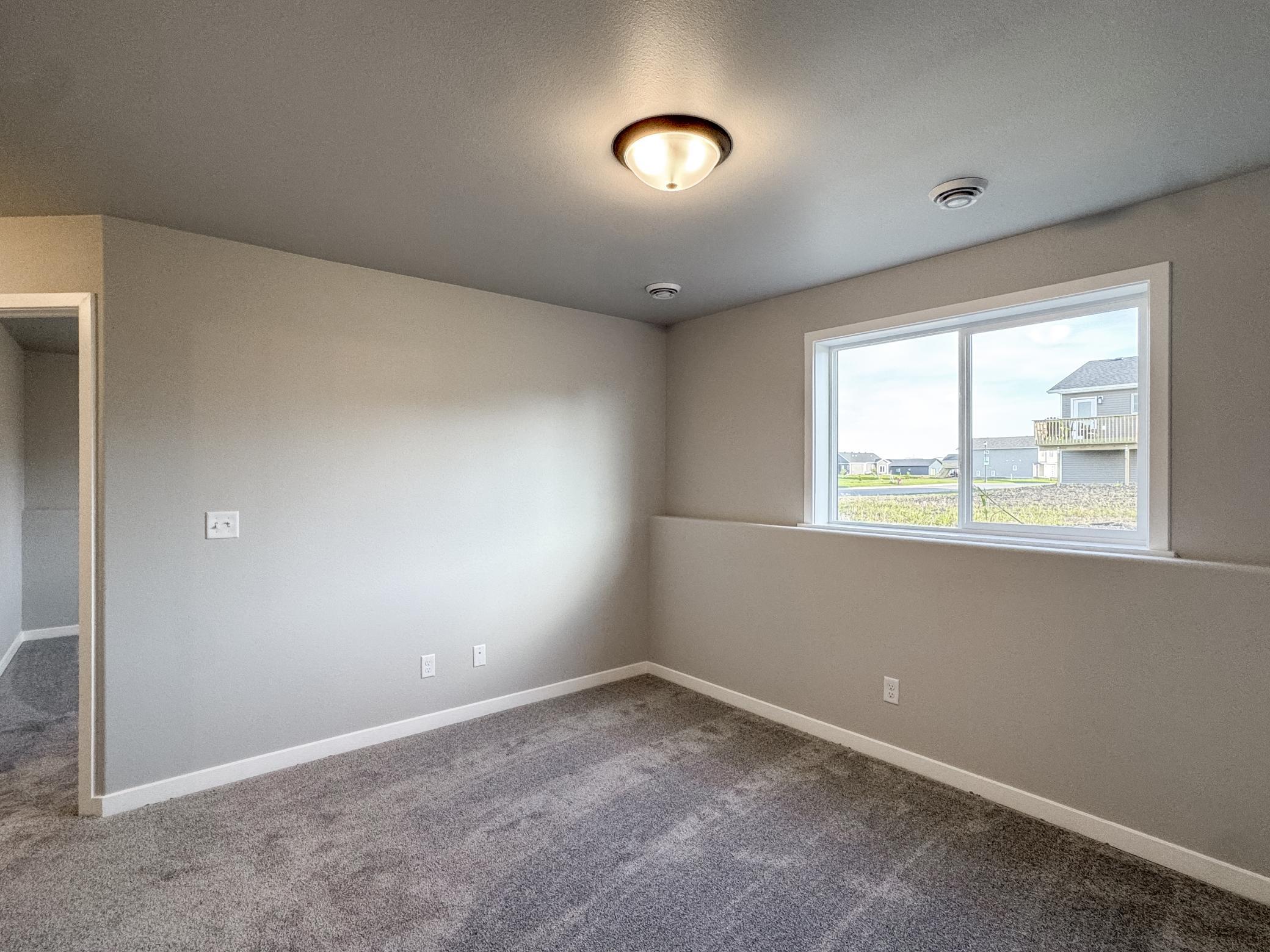 2025 single family home for sale at 1105 Jill Drive W in West Fargo, ND — 3 bed, 2 bath (photo 31 of 35)