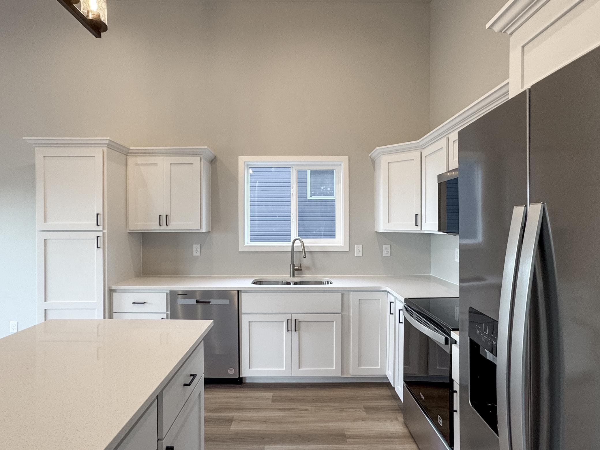 2025 single family home for sale at 1105 Jill Drive W in West Fargo, ND — 3 bed, 2 bath (photo 6 of 35)