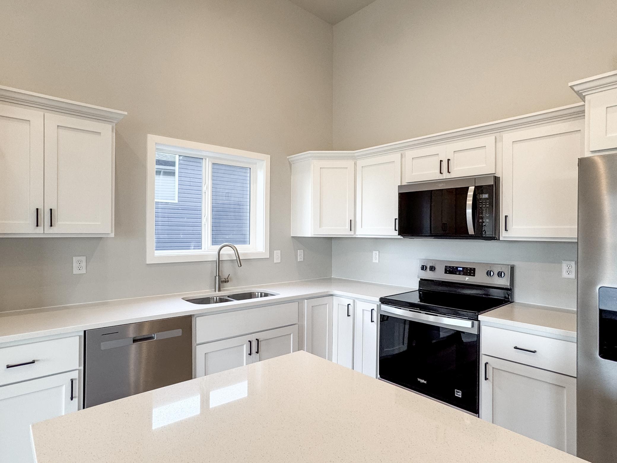 2025 single family home for sale at 1105 Jill Drive W in West Fargo, ND — 3 bed, 2 bath (photo 7 of 35)