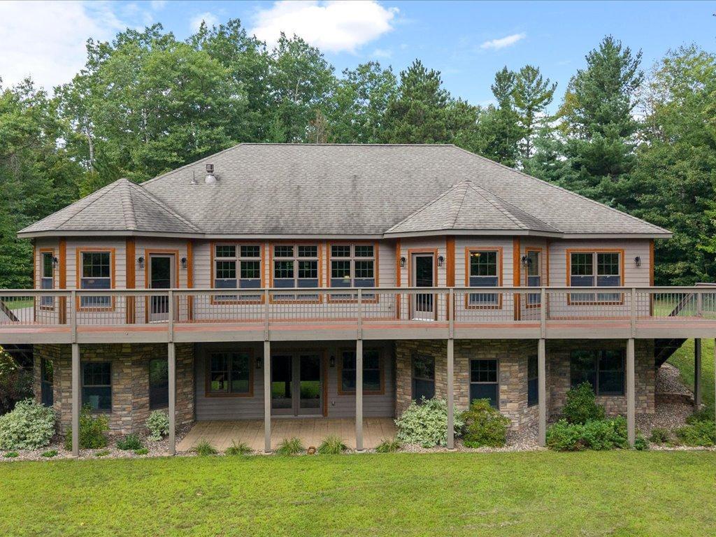 2010 single family home for sale at 22401 Camp Lincoln Road in Nisswa, MN — 5 bed, 3 bath (photo 2 of 60)