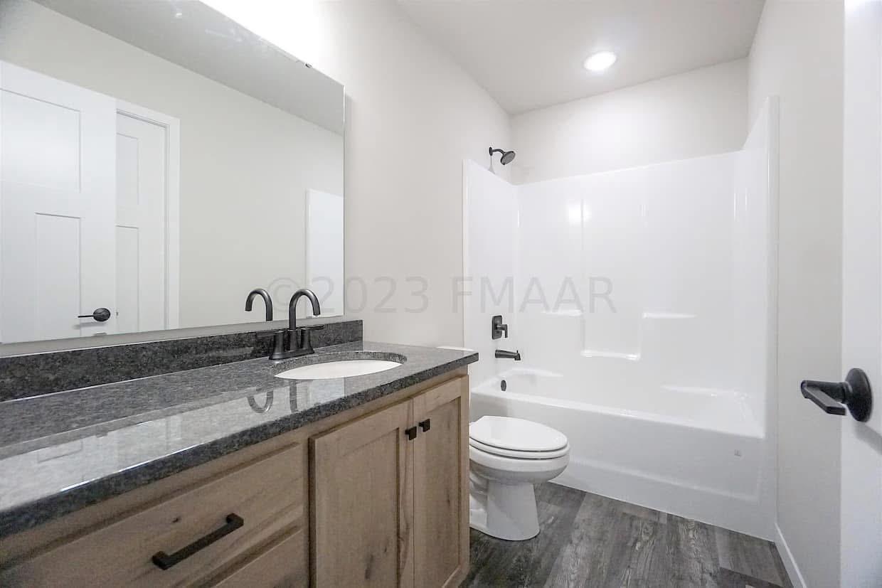 2026 single family home for sale at 1637 10th Avenue S in Fargo, ND — 4 bed, 2 bath (photo 4 of 6)