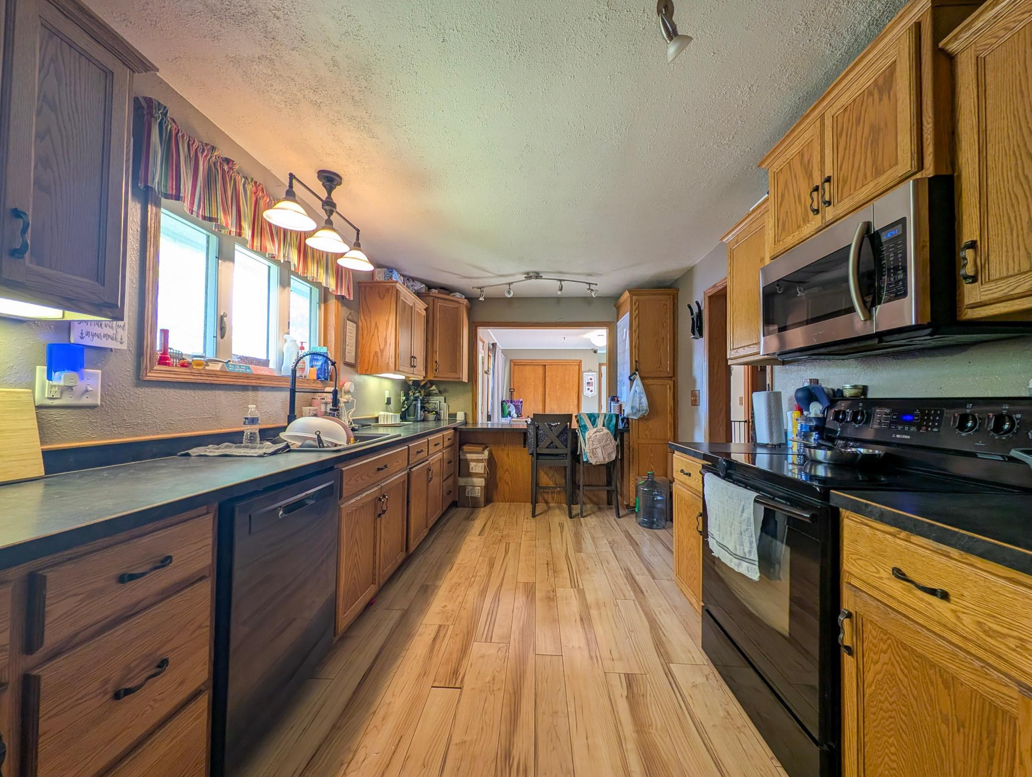 1954 single family home for sale at 220 2nd Avenue NW in Rothsay, MN — 5 bed, 2 bath (photo 7 of 31)