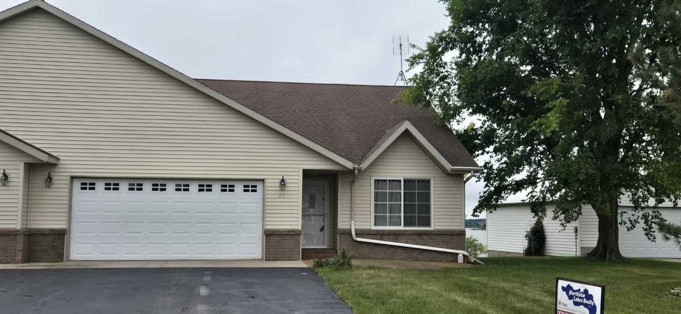 2002 townhouse for sale at 211 W Lake Street in Parkers Prairie, MN — 3 bed, 3 bath