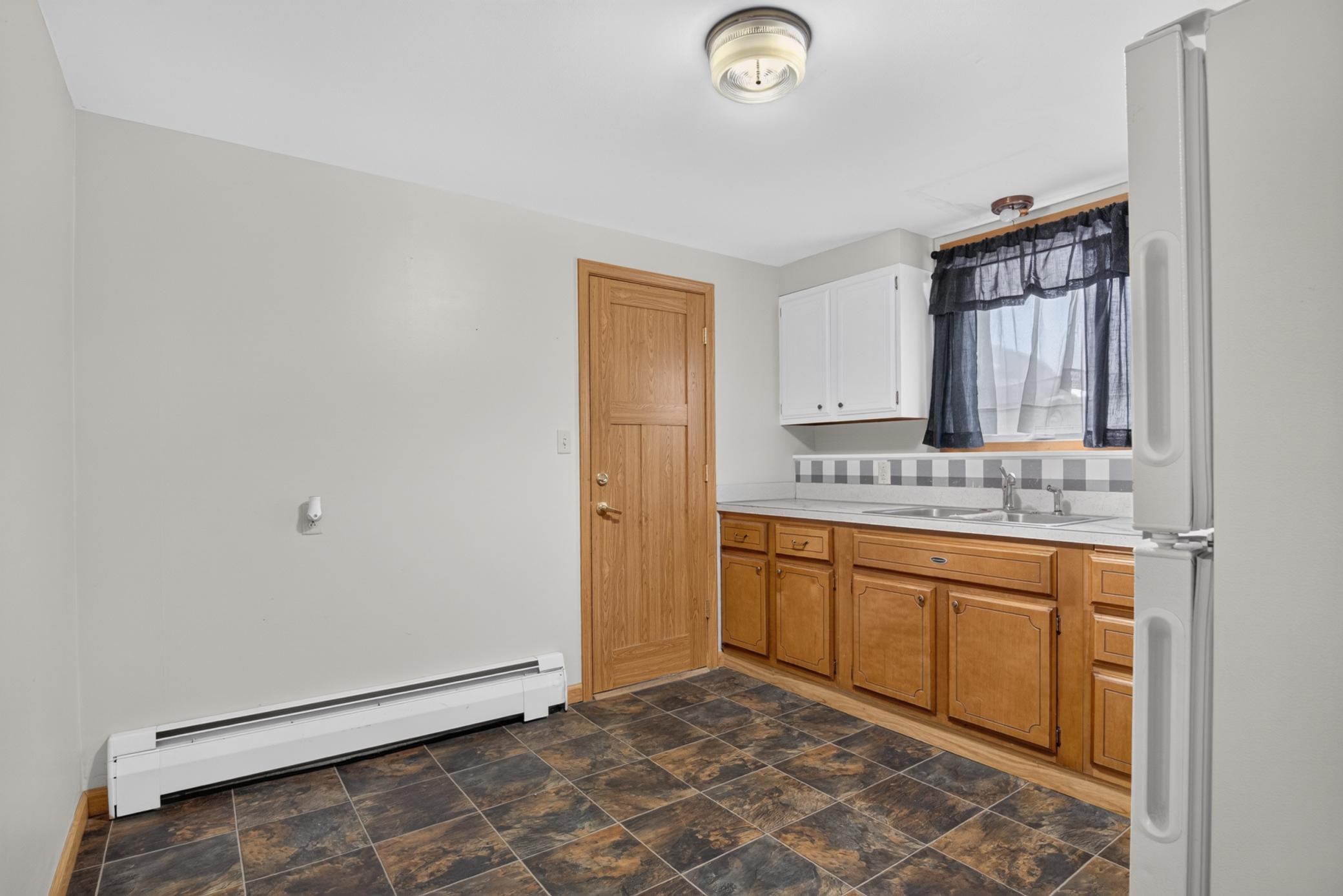 1967 single family home for sale at 224 5th Avenue NE, Unit 8 in Valley City, ND — 2 bed, 1 bath (photo 6 of 15)