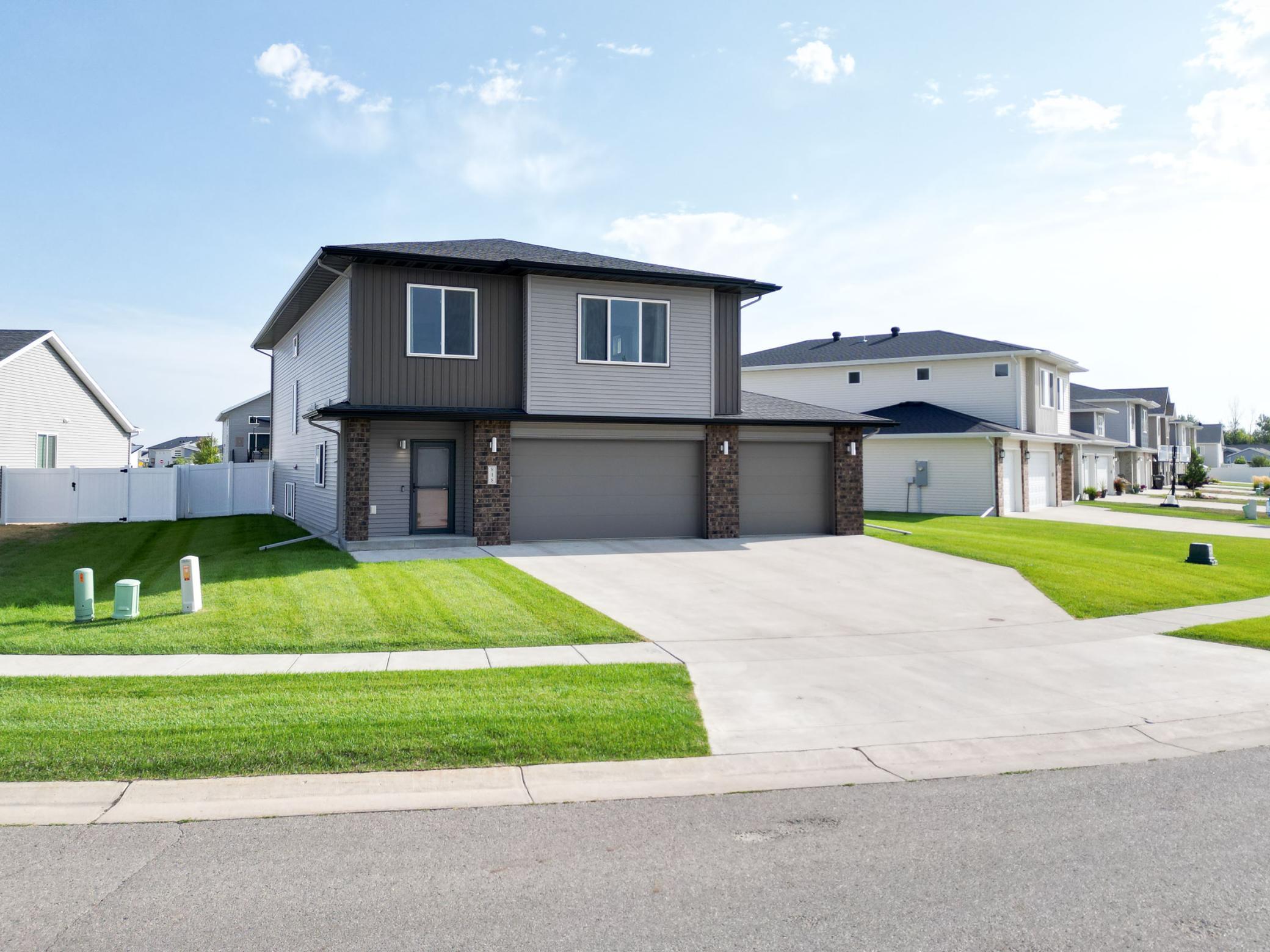 2018 single family home for sale at 818 ALBERT Drive W in West Fargo, ND — 4 bed, 3 bath (photo 2 of 59)