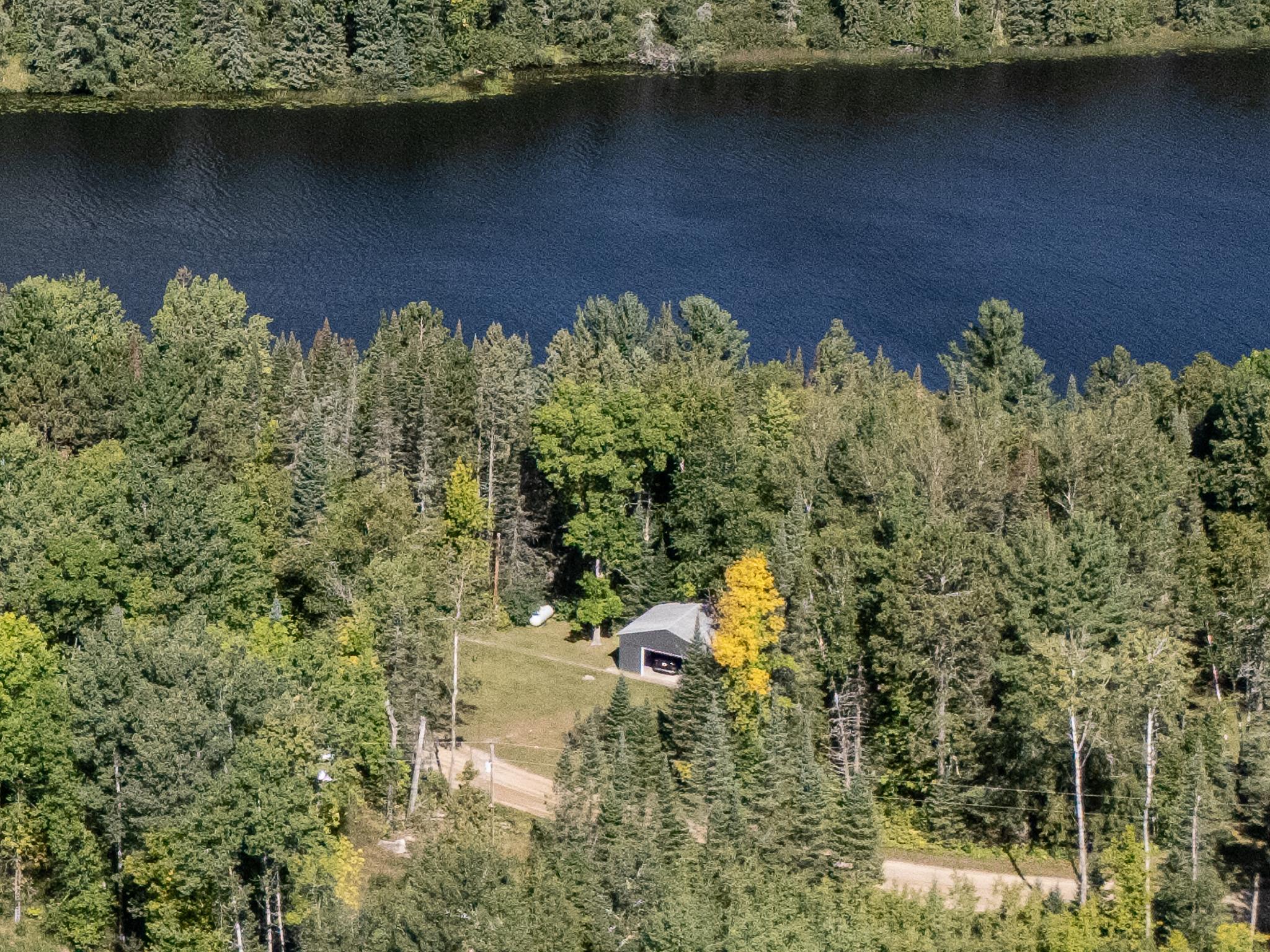 1980 single family home for sale at 7120 Quentin Road NE in Outing, MN — 2 bed, 1 bath (photo 2 of 59)