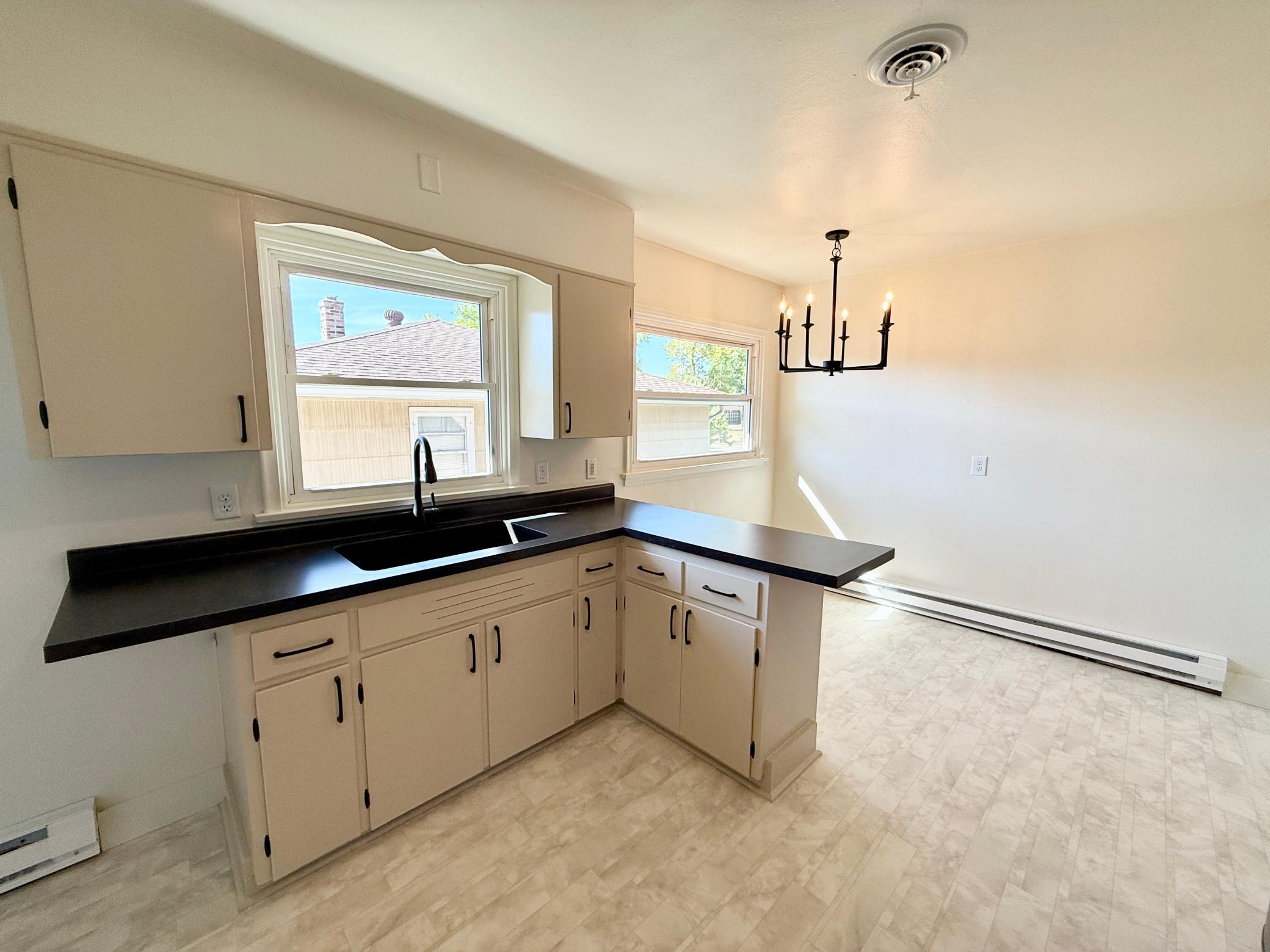 1950 single family home for sale at 862 2nd Avenue NW in Valley City, ND — 5 bed, 2 bath (photo 9 of 26)