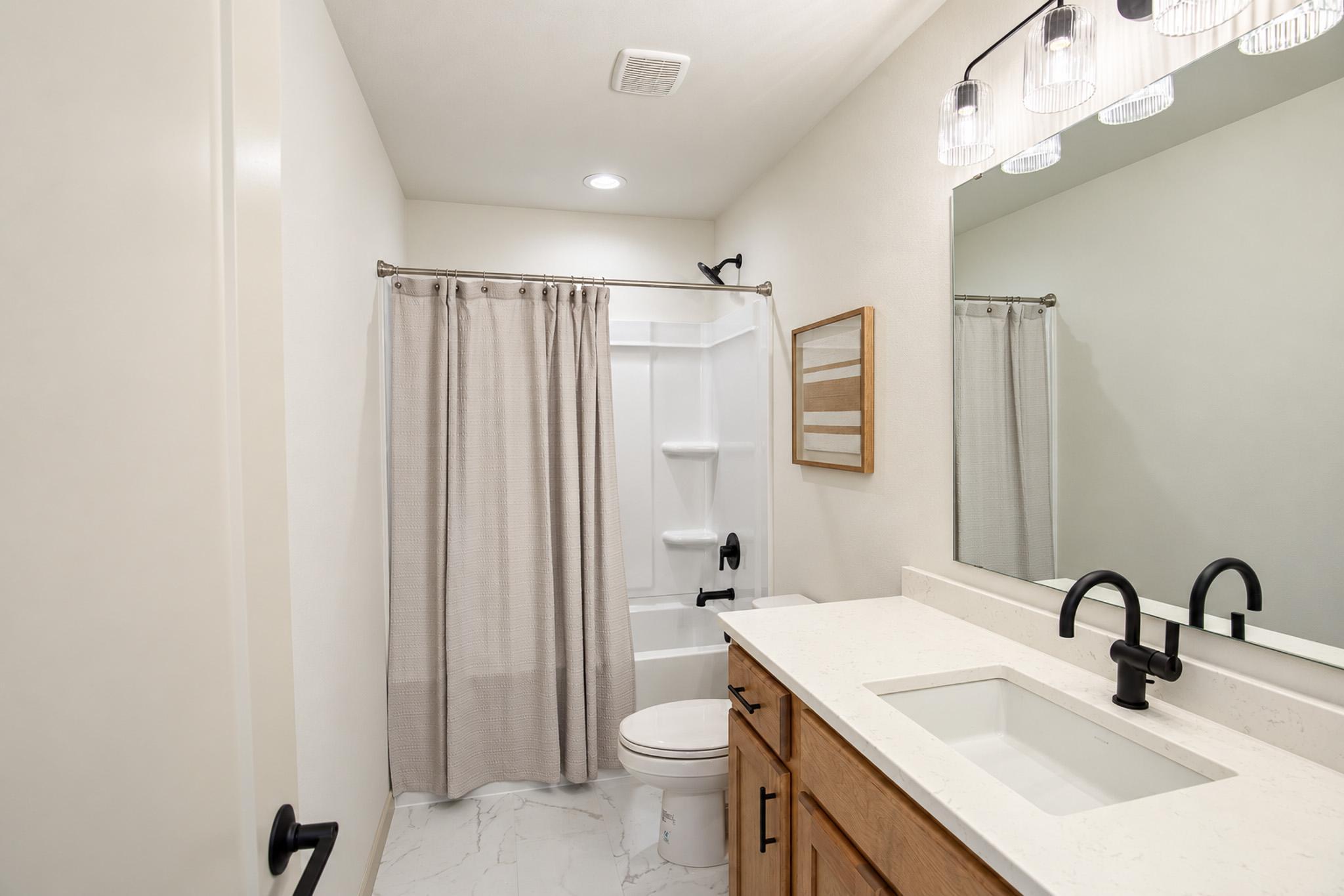 2026 single family home for sale at 1409 66th Avenue S in Fargo, ND — 5 bed, 3 bath (photo 24 of 25)