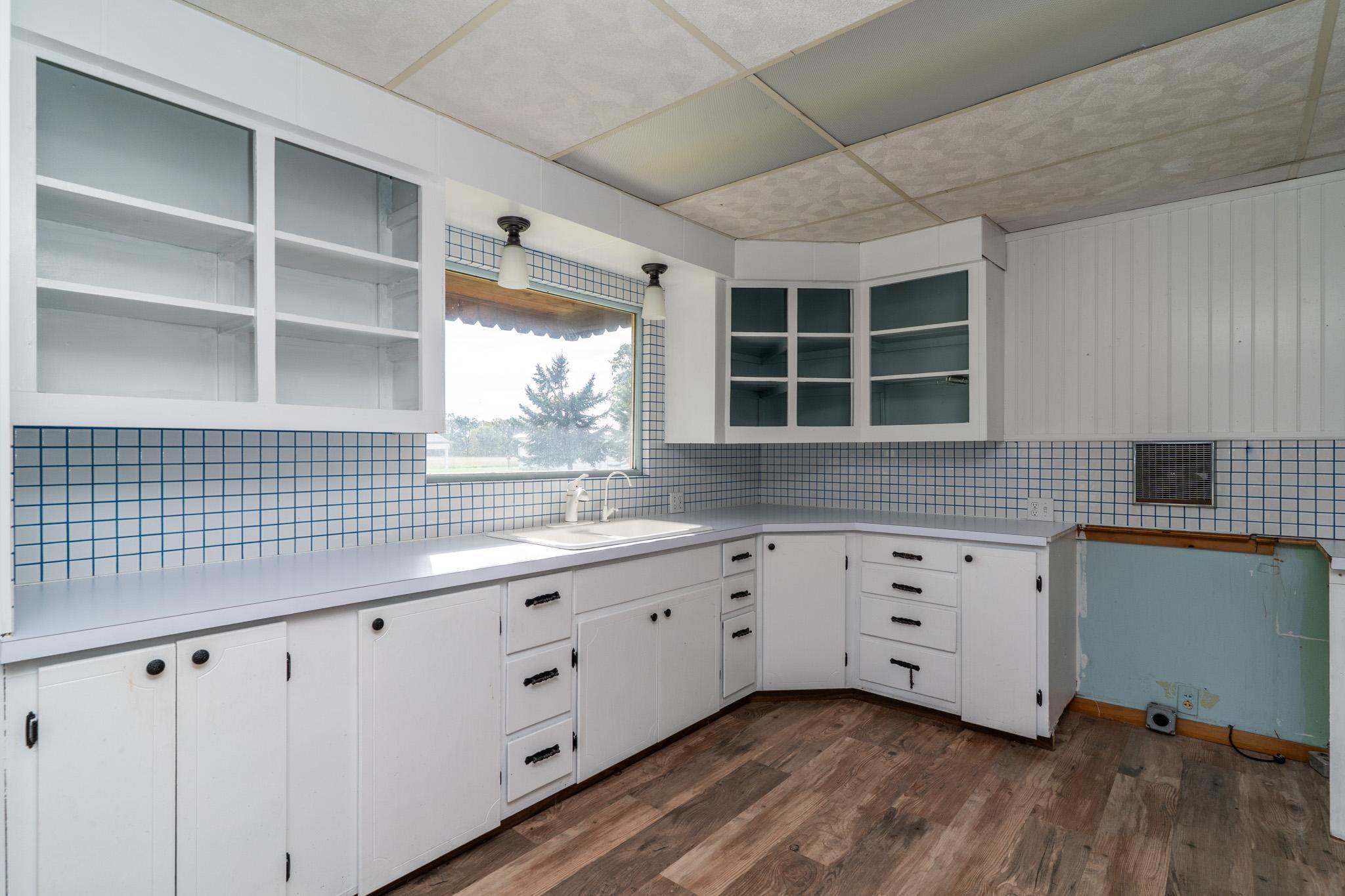 1938 single family home for sale at 707 Mckinley Street SE in Fertile, MN — 2 bed, 1 bath (photo 5 of 50)
