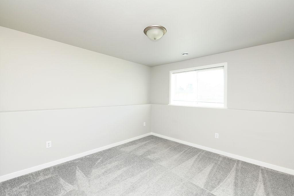 2024 single family home for sale at 1143 60th Avenue W in West Fargo, ND — 4 bed, 2 bath (photo 23 of 29)