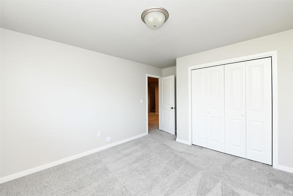 2024 single family home for sale at 1143 60th Avenue W in West Fargo, ND — 4 bed, 2 bath (photo 24 of 29)