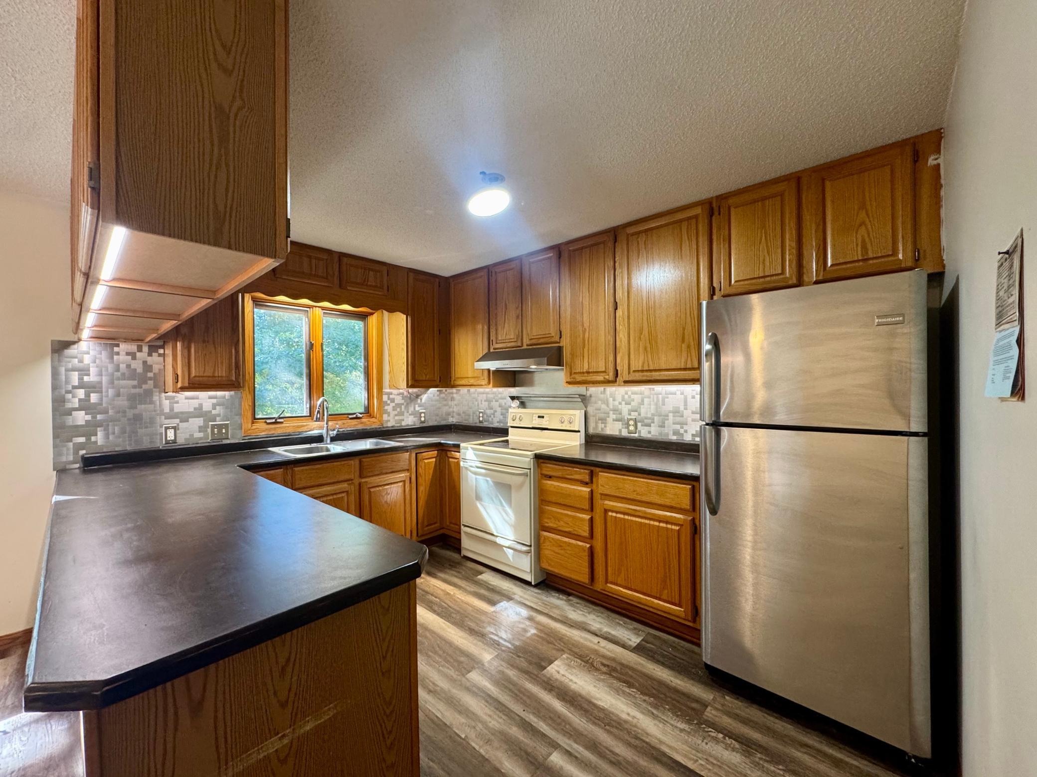 1993 single family home for sale at 5150 Sherman Drive NE in Bemidji, MN — 4 bed, 3 bath (photo 3 of 49)