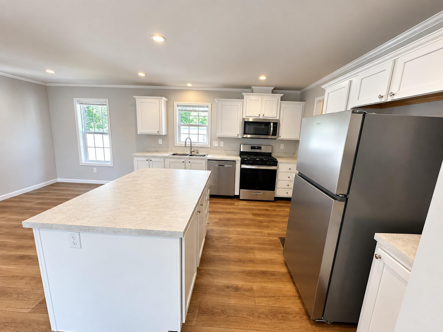 2026 single family home for sale at 215 N Mckay Avenue, Unit 2 in Alexandria, MN — 3 bed, 2 bath (photo 3 of 10)