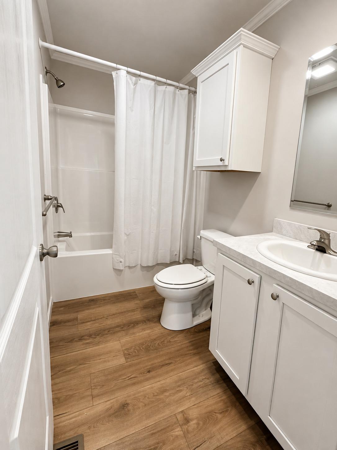 2026 single family home for sale at 215 N Mckay Avenue, Unit 2 in Alexandria, MN — 3 bed, 2 bath (photo 9 of 10)